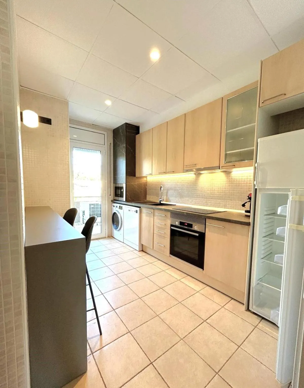 Kitchen or kitchenette in Apartaments Terraza - Santa Maria