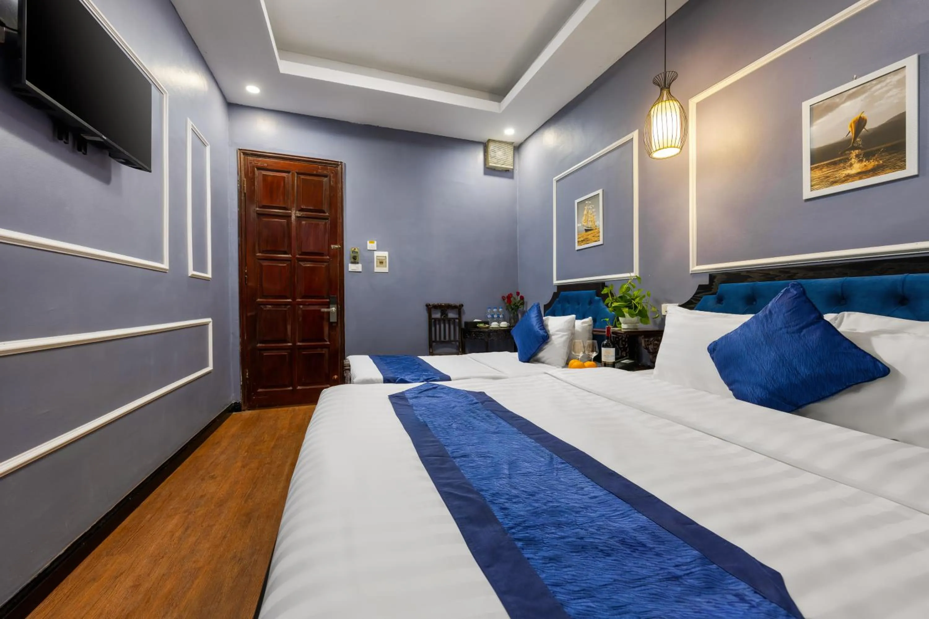 Bed in Amanda Boutique Hotel & Travel