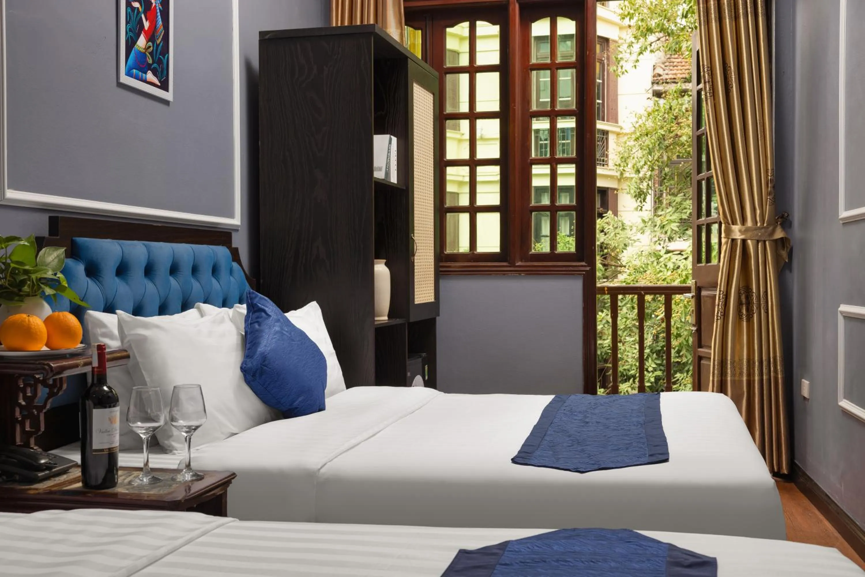 Bed in Amanda Boutique Hotel & Travel