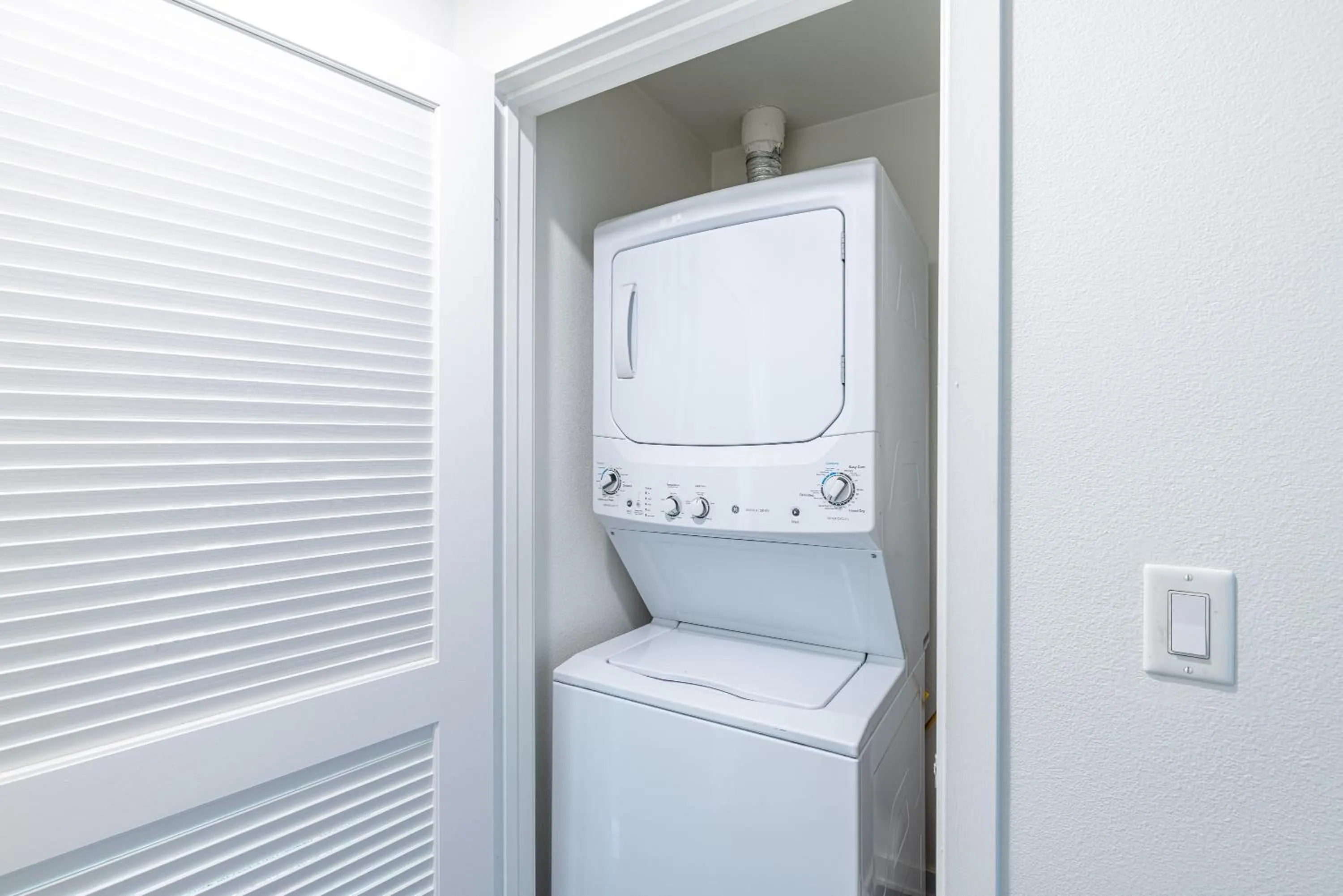 washing machine in Hollywood Furnished Apartments