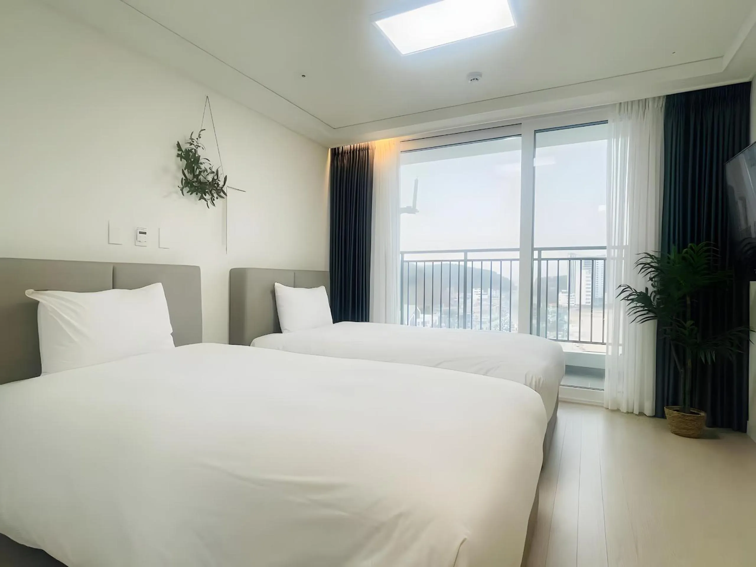 Bed in SurfResort INN-The City YangYang