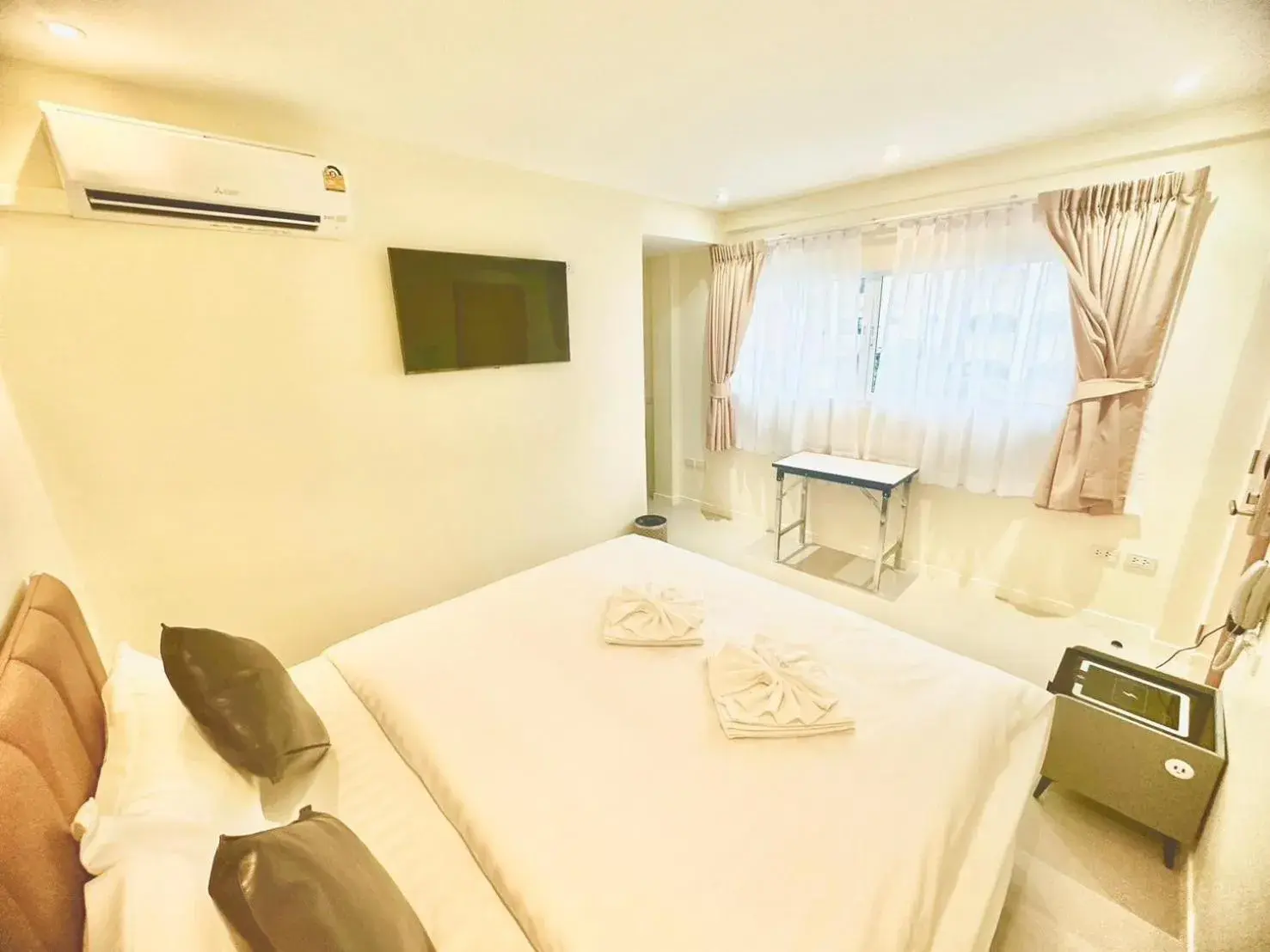 Bed in ABC HA Hotel Bangkok Bed in ABC HA Hotel Bangkok