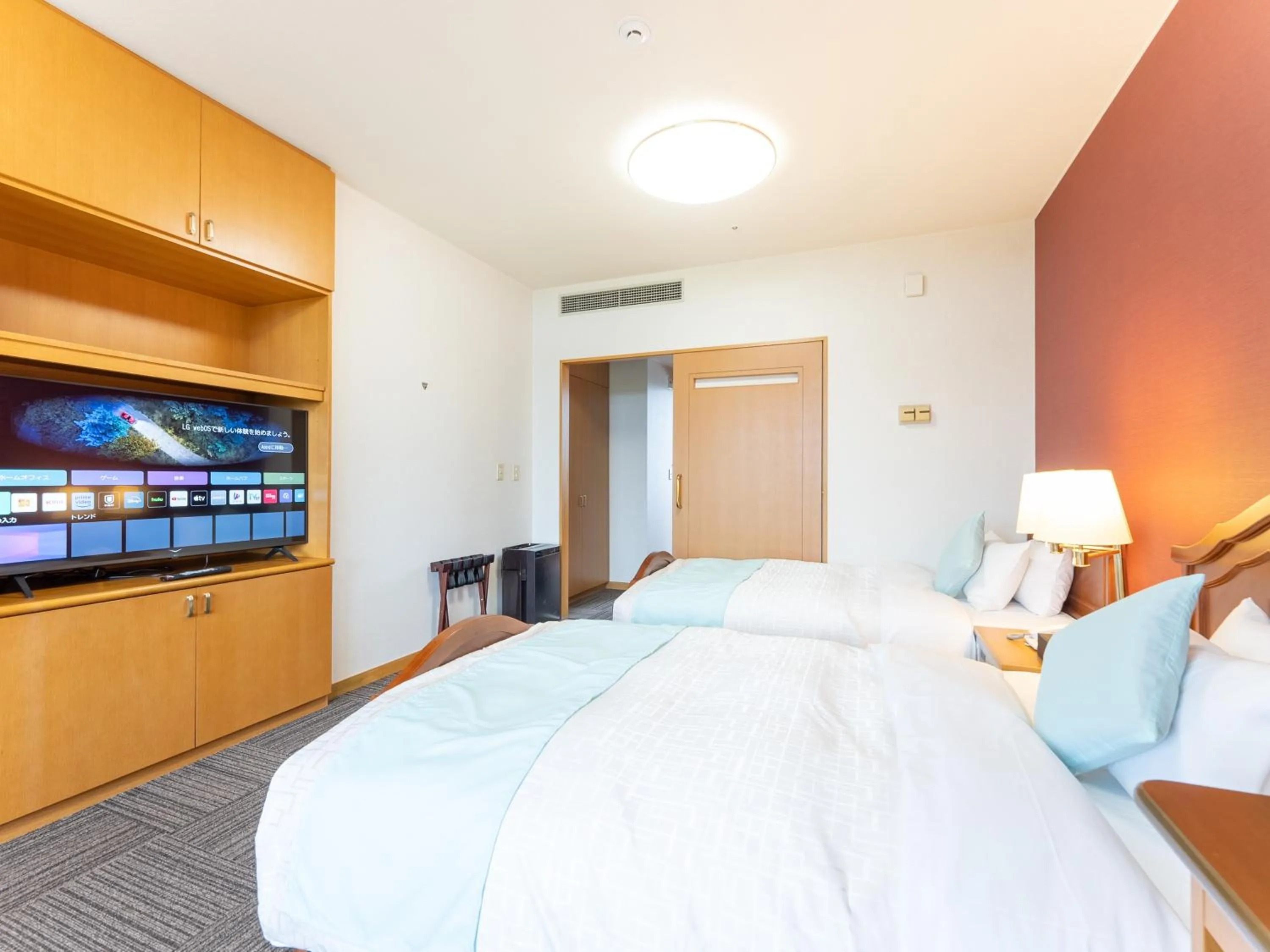 Bed in LiVEMAX Resort Upopoi Shiraoi Onsen