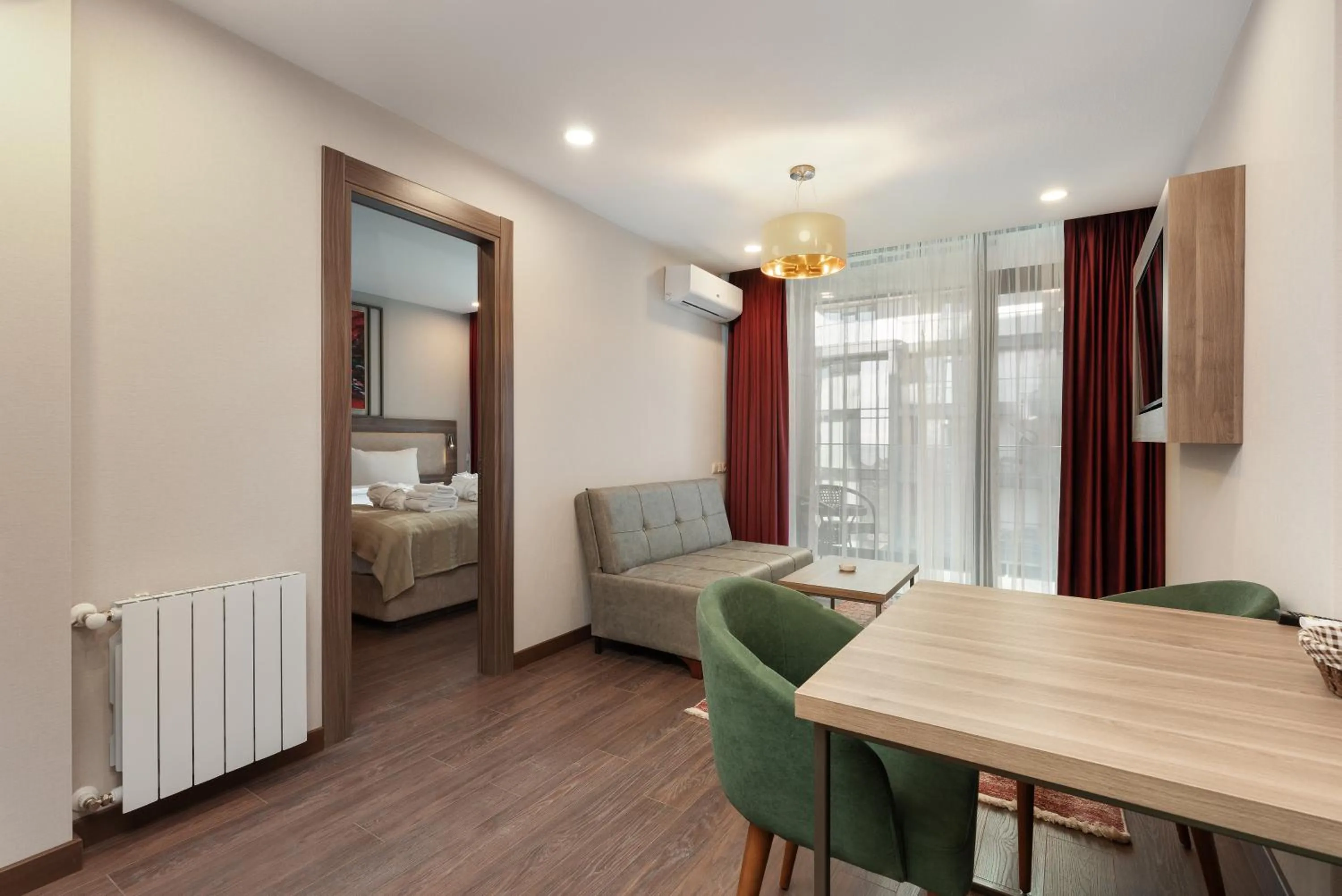 Dining area, Bed in Sunshine Residence & Hotel