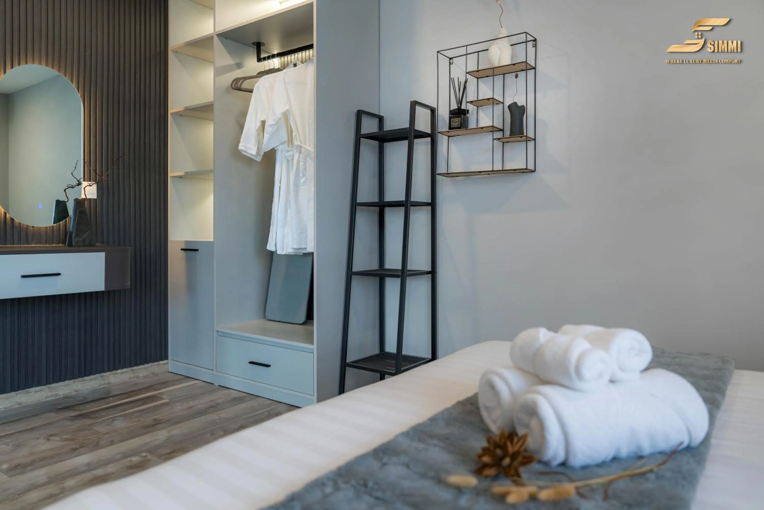 wardrobe, Bed in Simmi Signature Hotel & Apartment