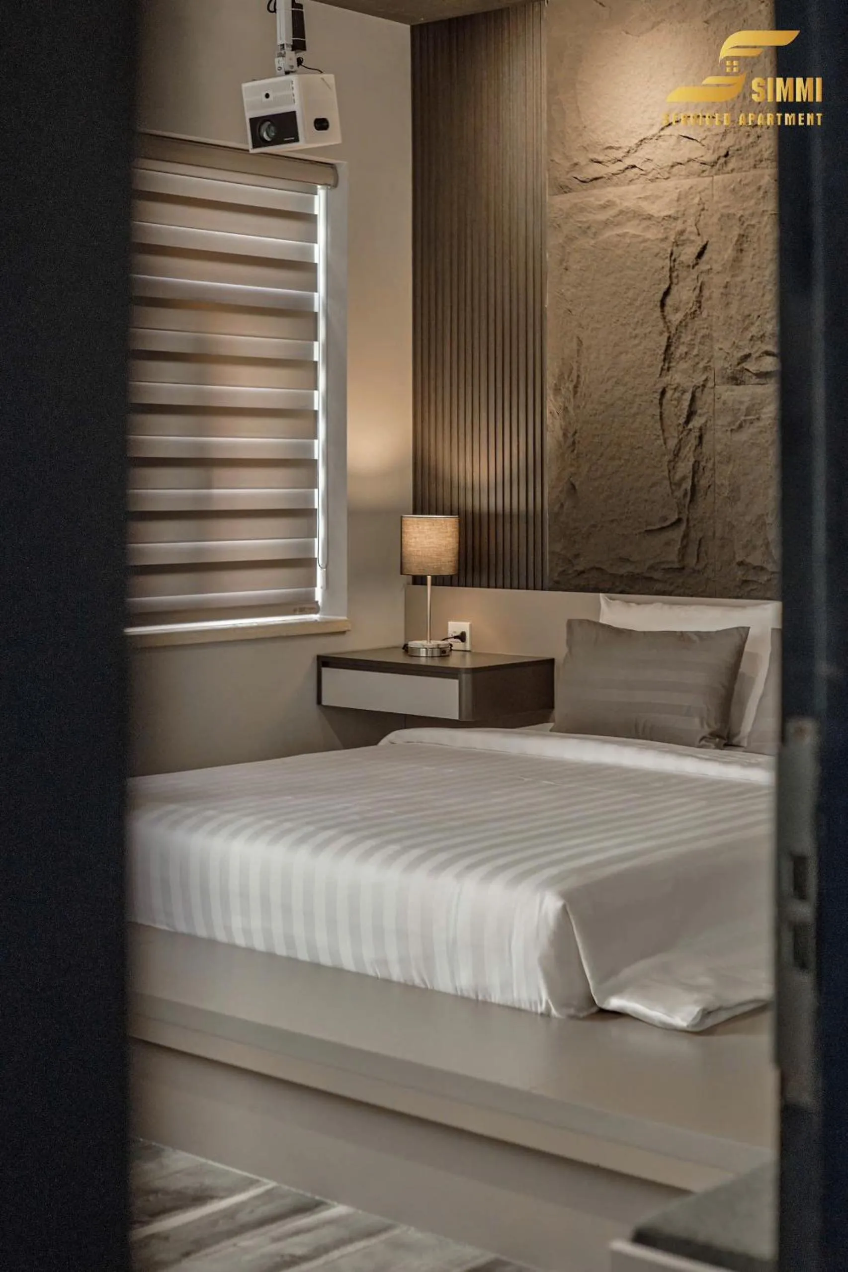 Bed in Simmi Signature Hotel & Apartment