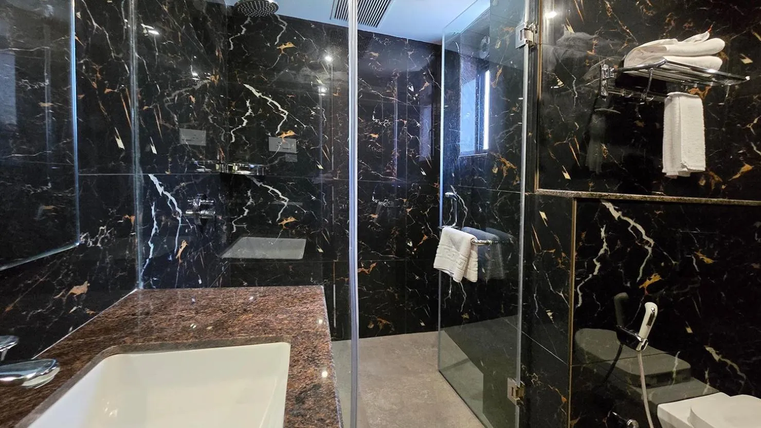 Bathroom in Magnus Nexstar Suites Kalyani Nagar