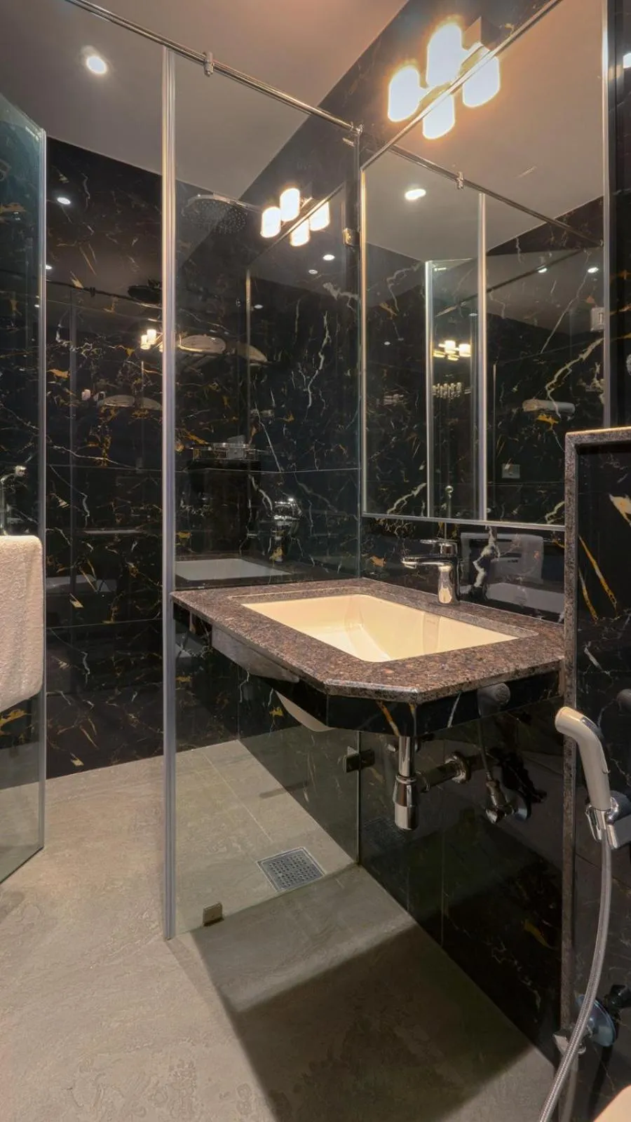 Bathroom in Magnus Nexstar Suites Kalyani Nagar