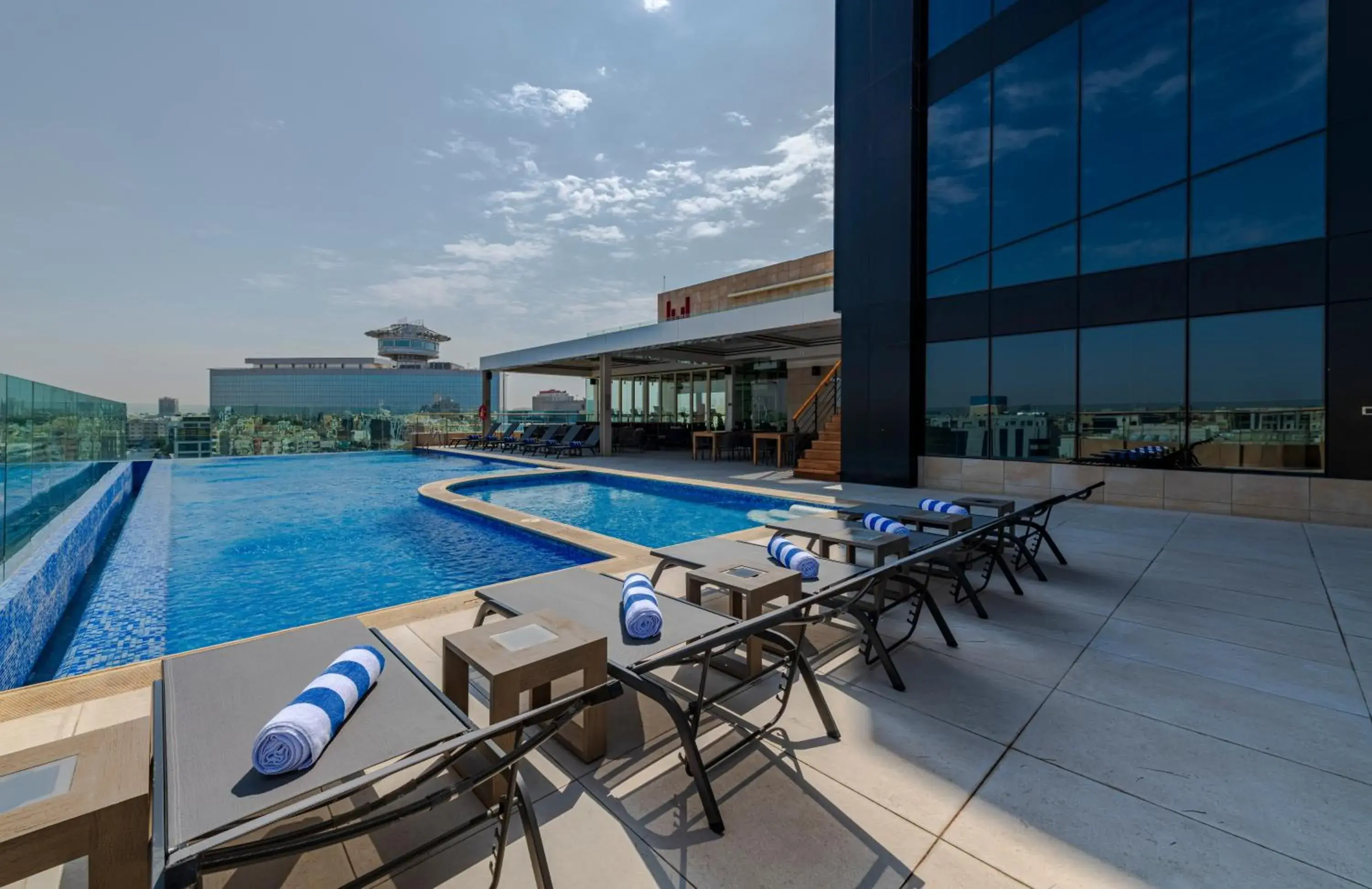 Swimming pool in Millennium Al Masar Swimming pool in Millennium Al Masar