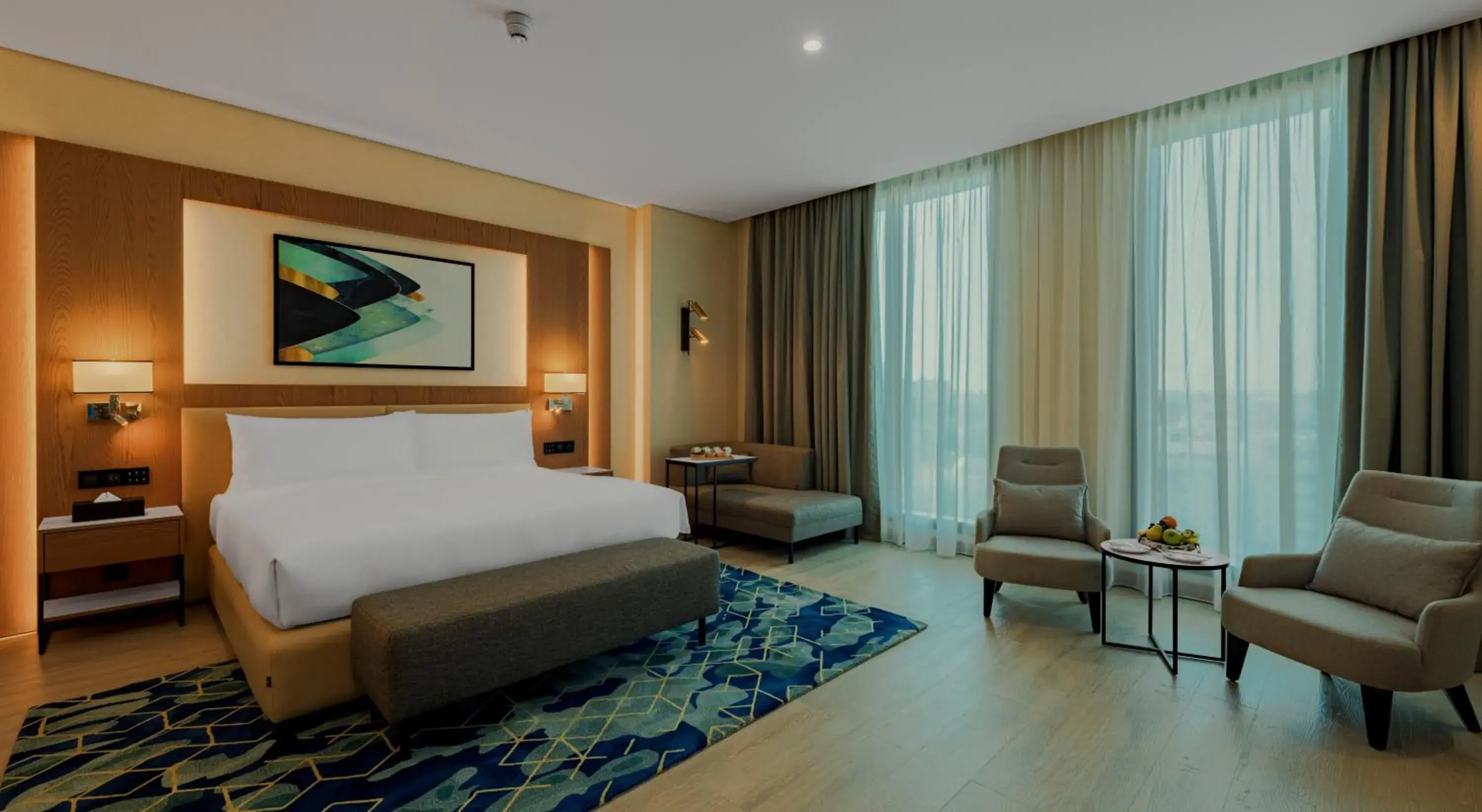 Junior Suite in Millennium Al Masar Junior Suite in Millennium Al Masar