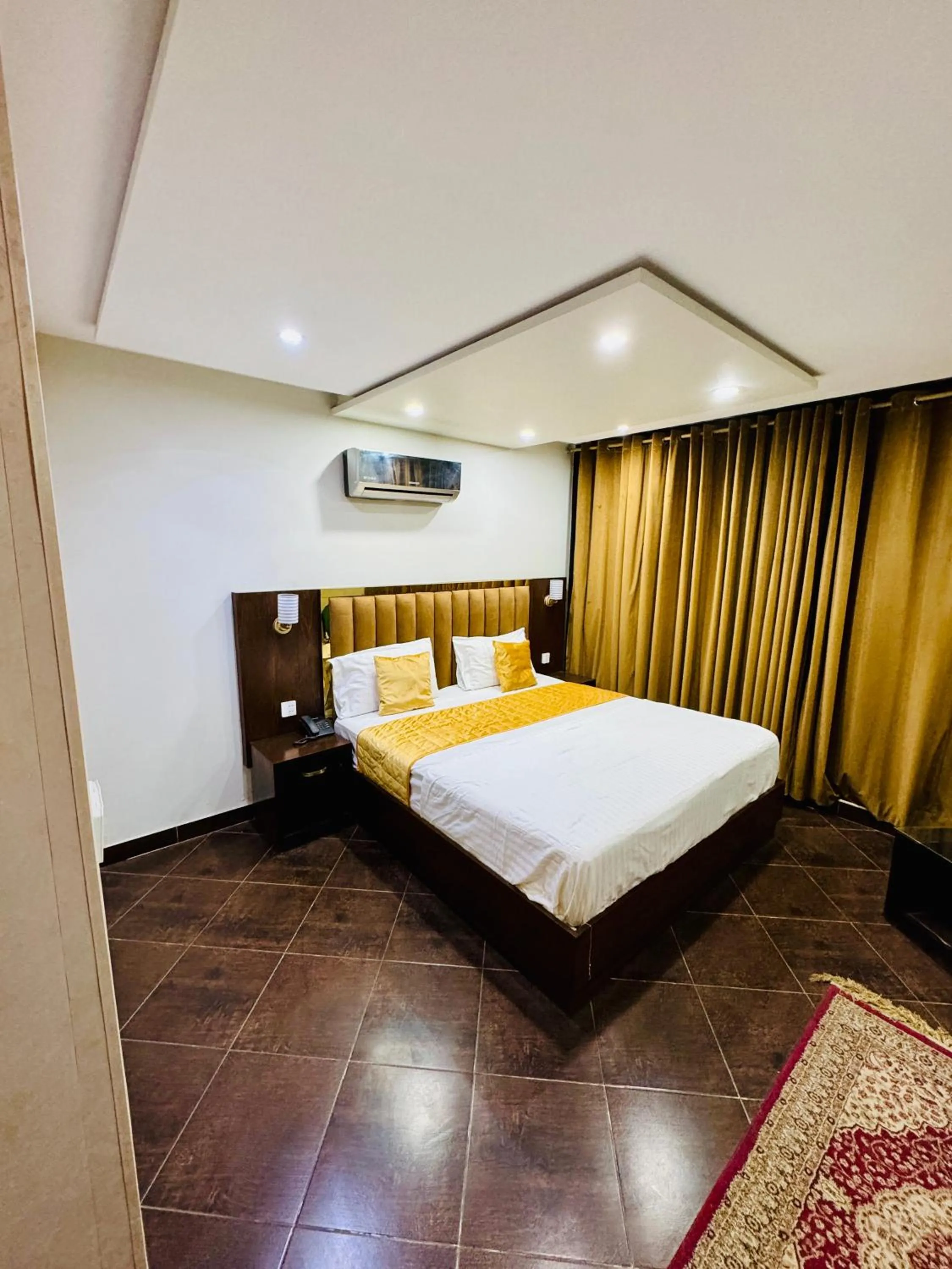 Bed in Bling International Hotel Multan