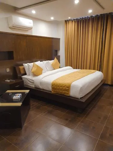 Bed in Bling International Hotel Multan