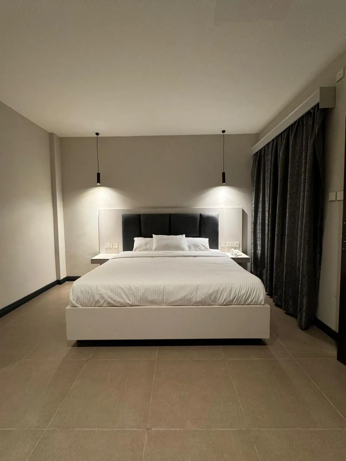 Bed in The Ivory Hotel