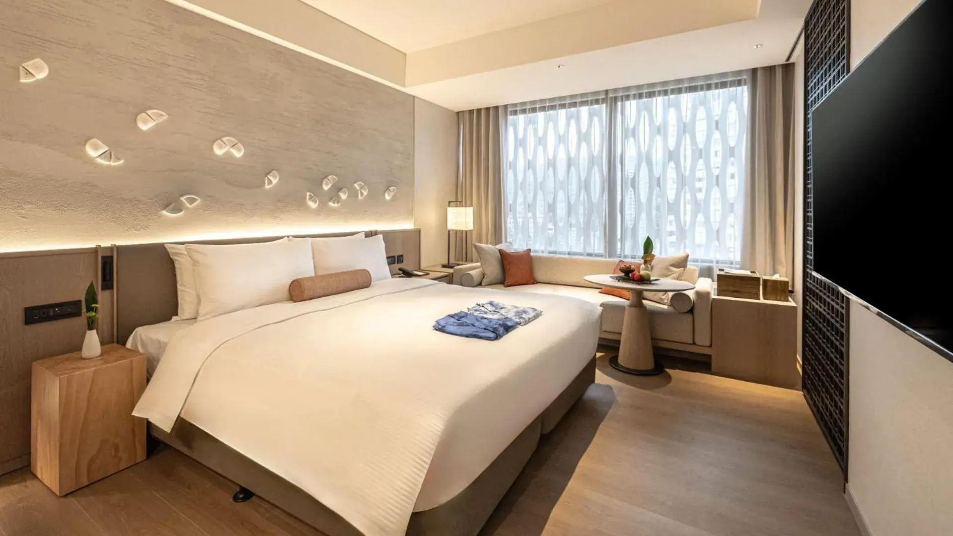 Bed in 北投晶泉丰旅 Wellspring by Silks Beitou Bed in 北投晶泉丰旅 Wellspring by Silks Beitou