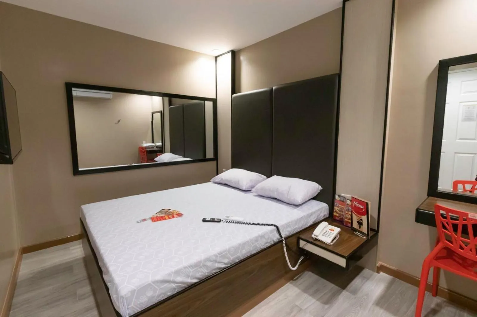 Photo of the whole room, Bed in Hotel Sogo Cagayan De Oro