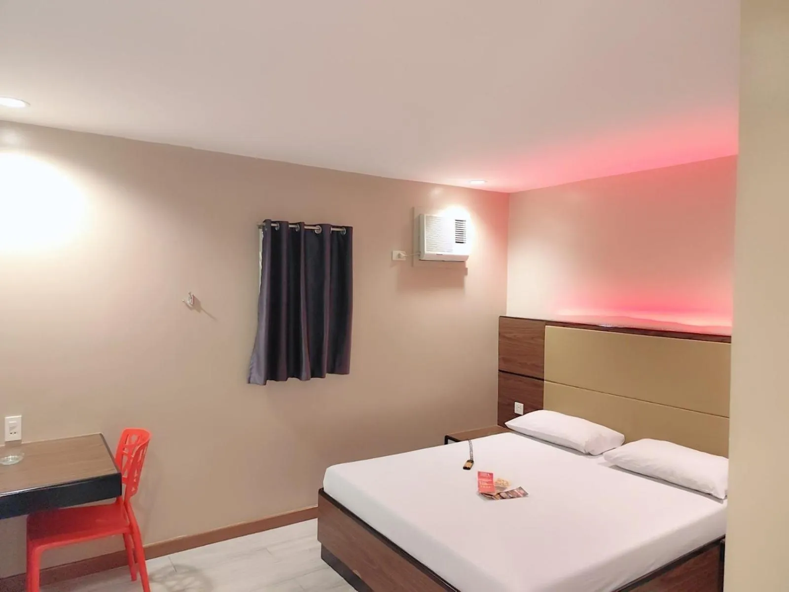 Photo of the whole room, Bed in Hotel Sogo Cagayan De Oro