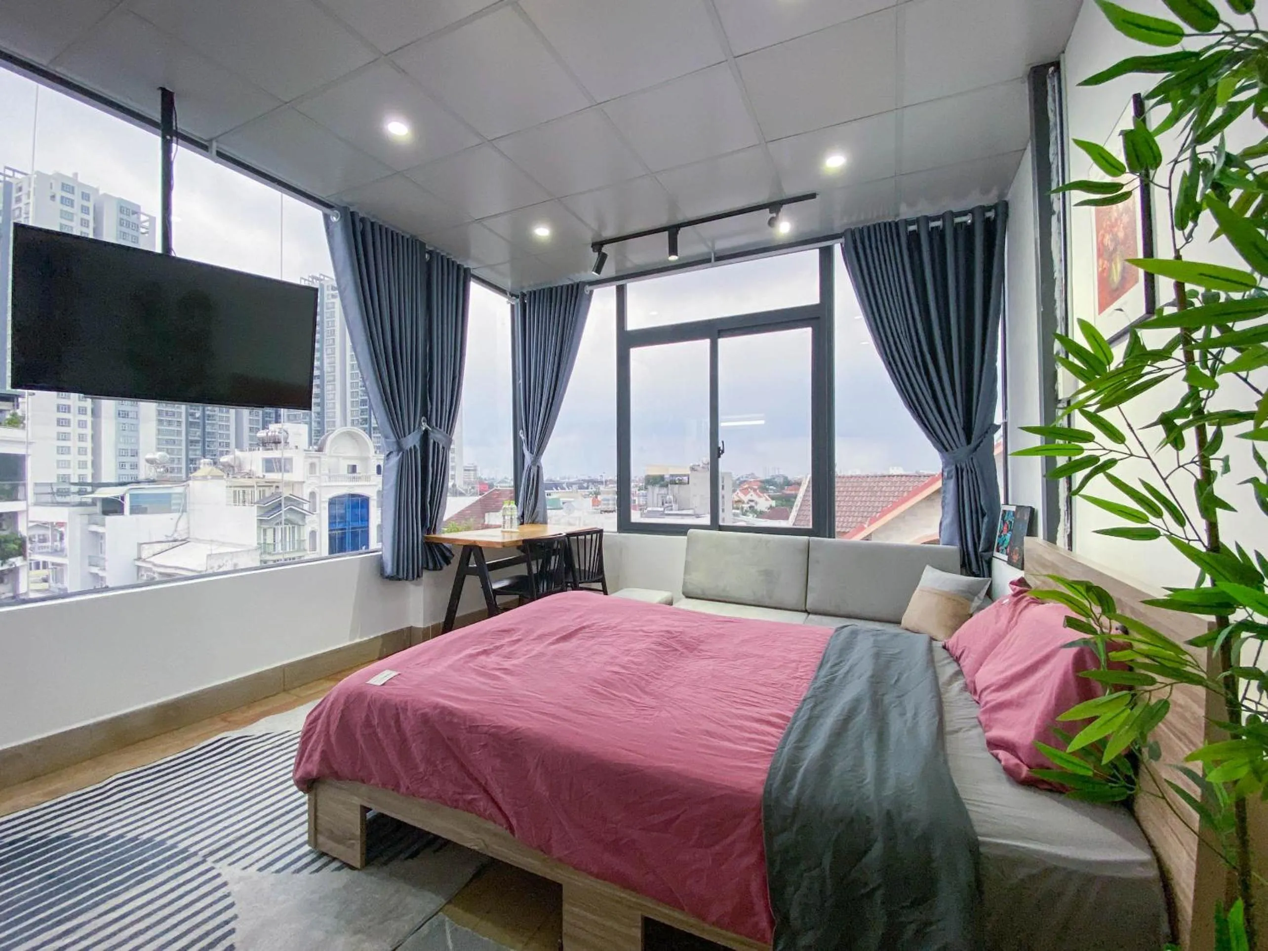 Communal lounge/ TV room, Bed in Zeus Living - Cozy Apartment in Thao Dien