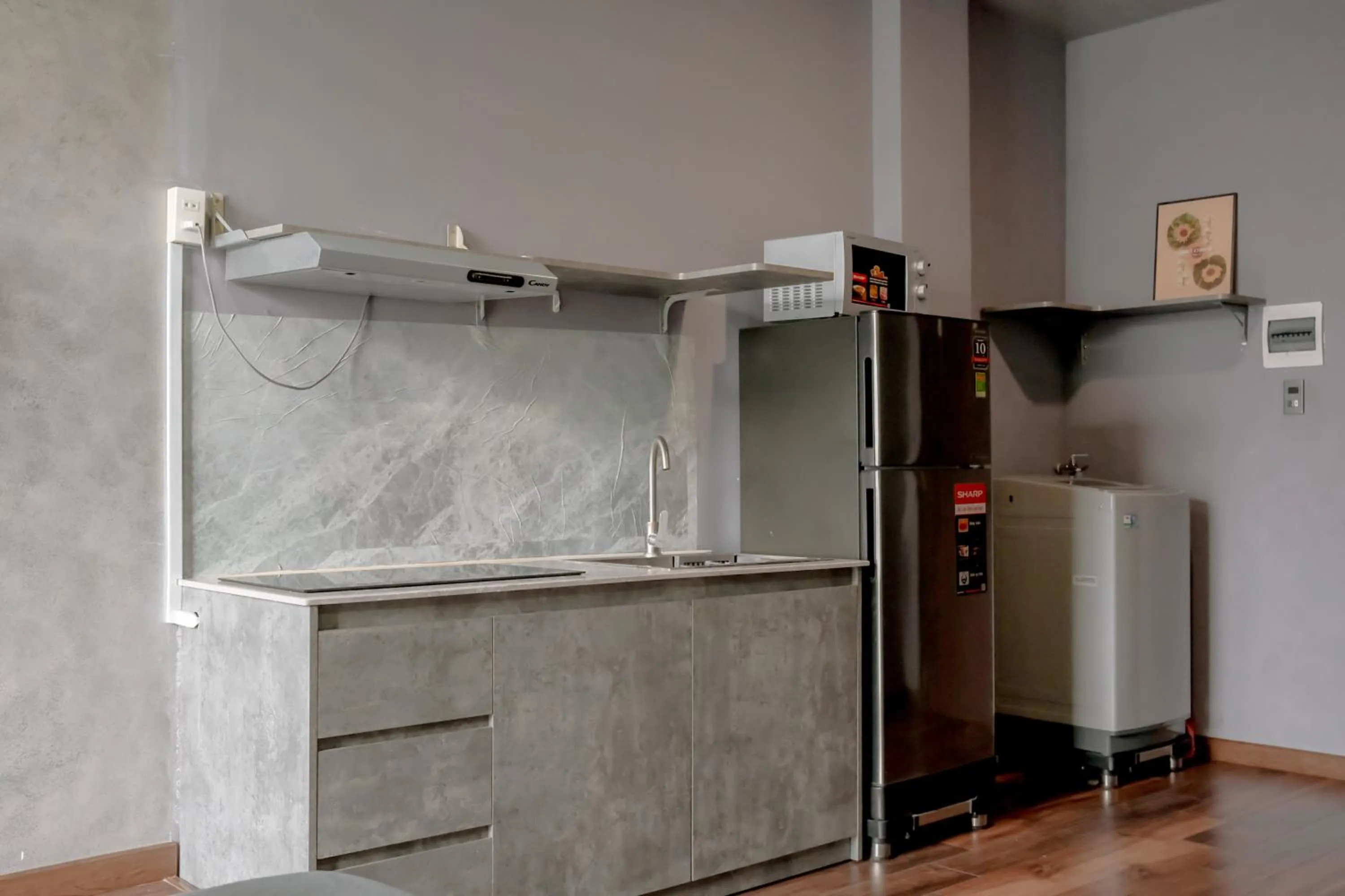 Kitchen or kitchenette in Zeus Living - Cozy Apartment in Thao Dien