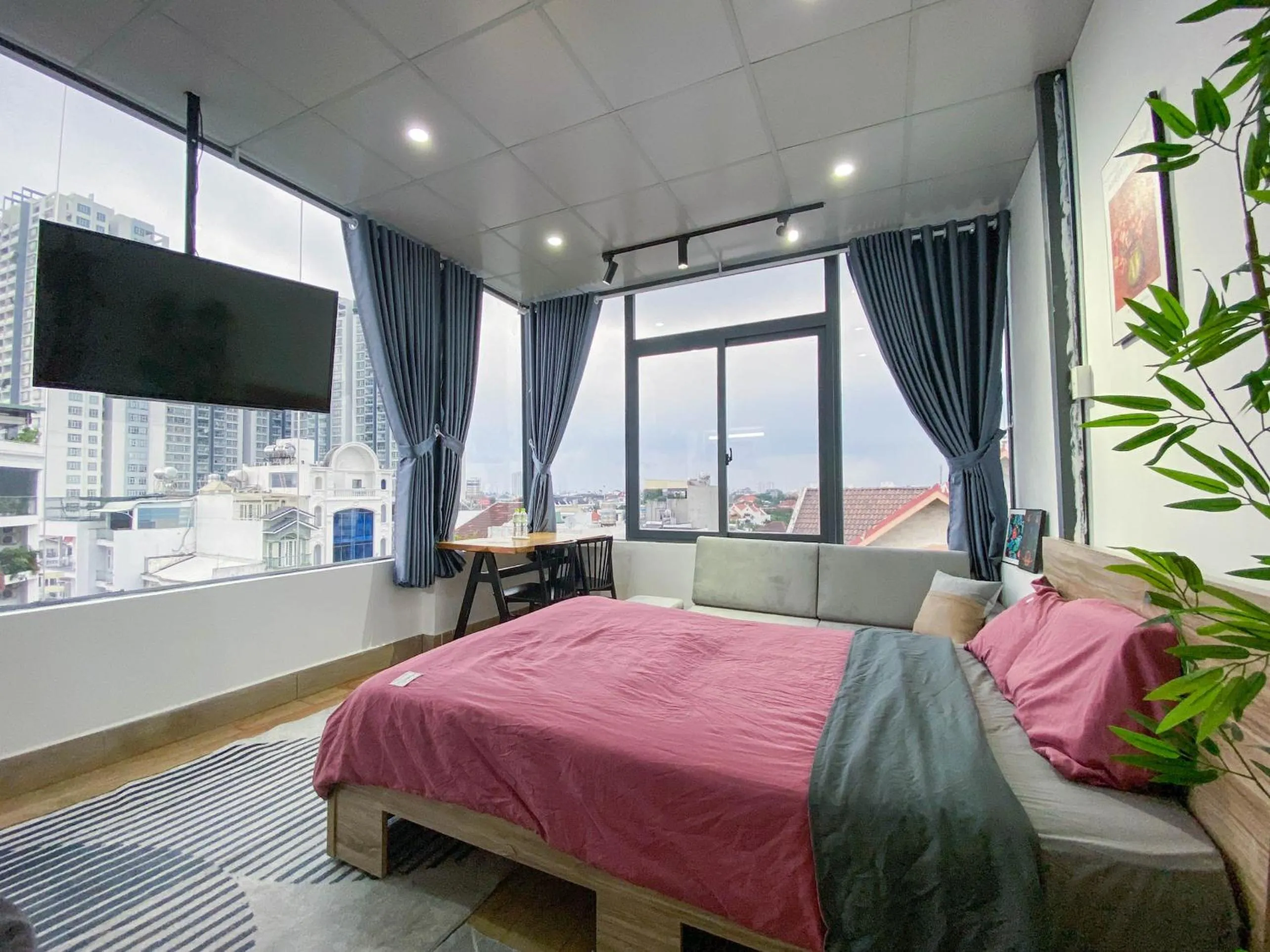 Communal lounge/ TV room, Bed in Zeus Living - Cozy Apartment in Thao Dien