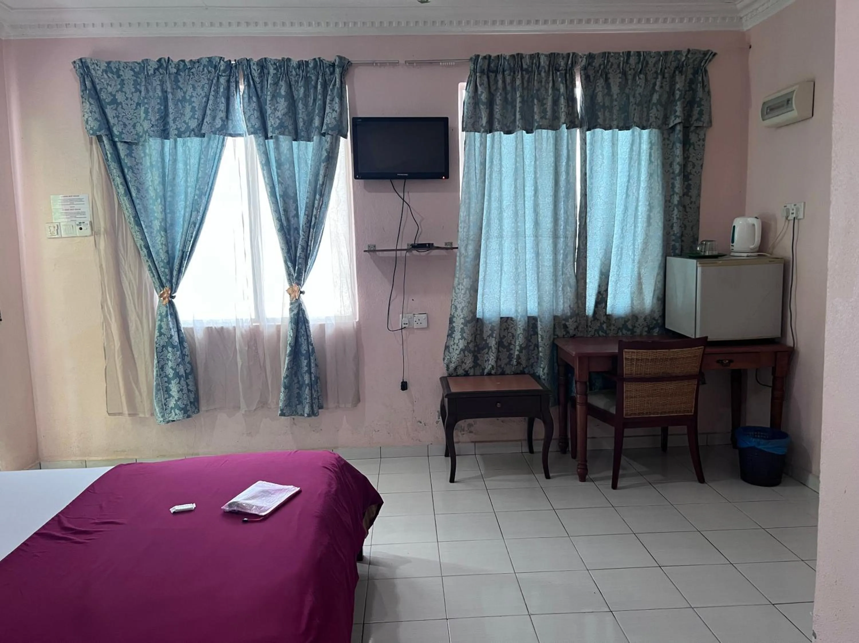 Bedroom in OYO 90981 Chenang Rest House 1