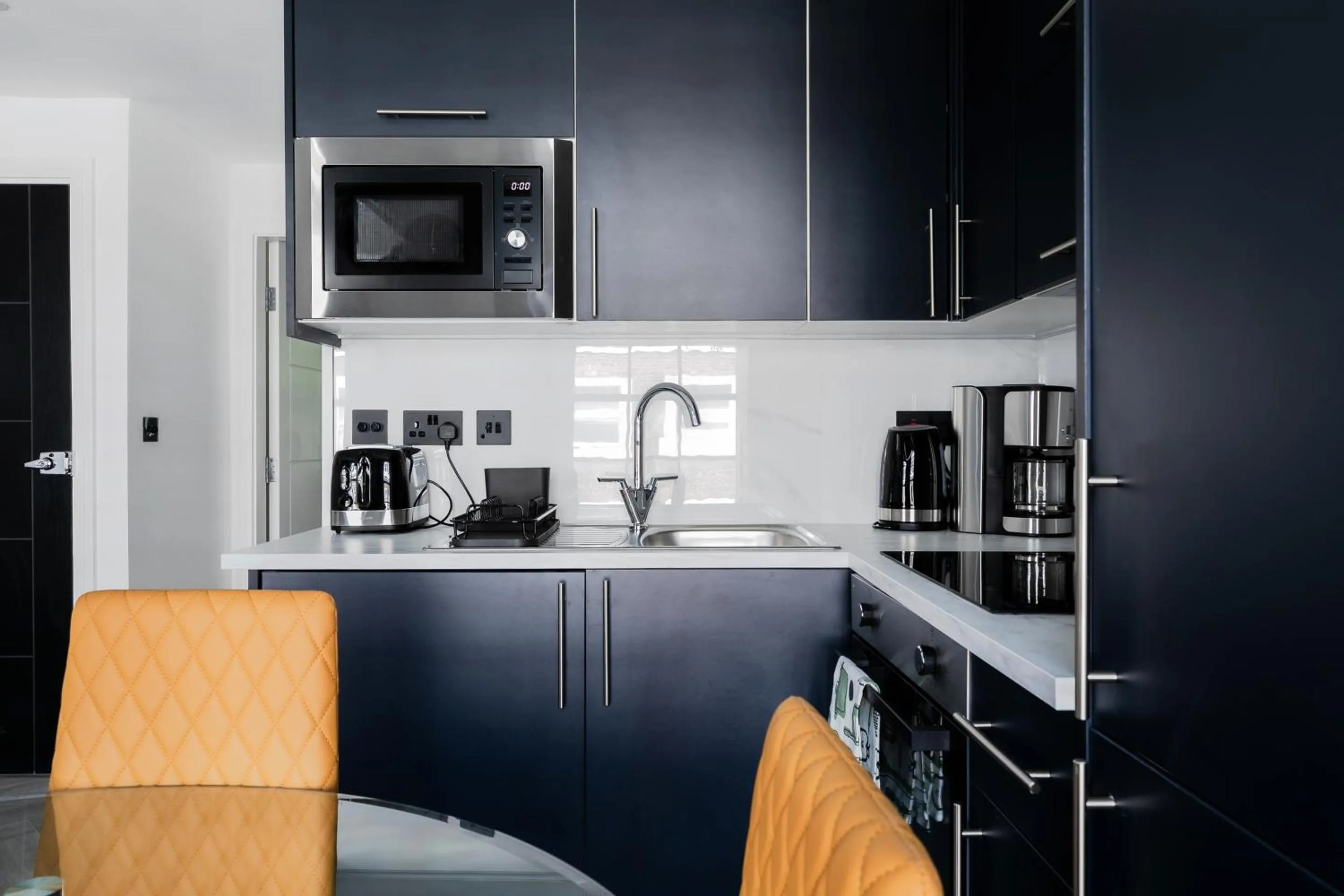 Kitchen or kitchenette in Comfortable Apartments near Harrods
