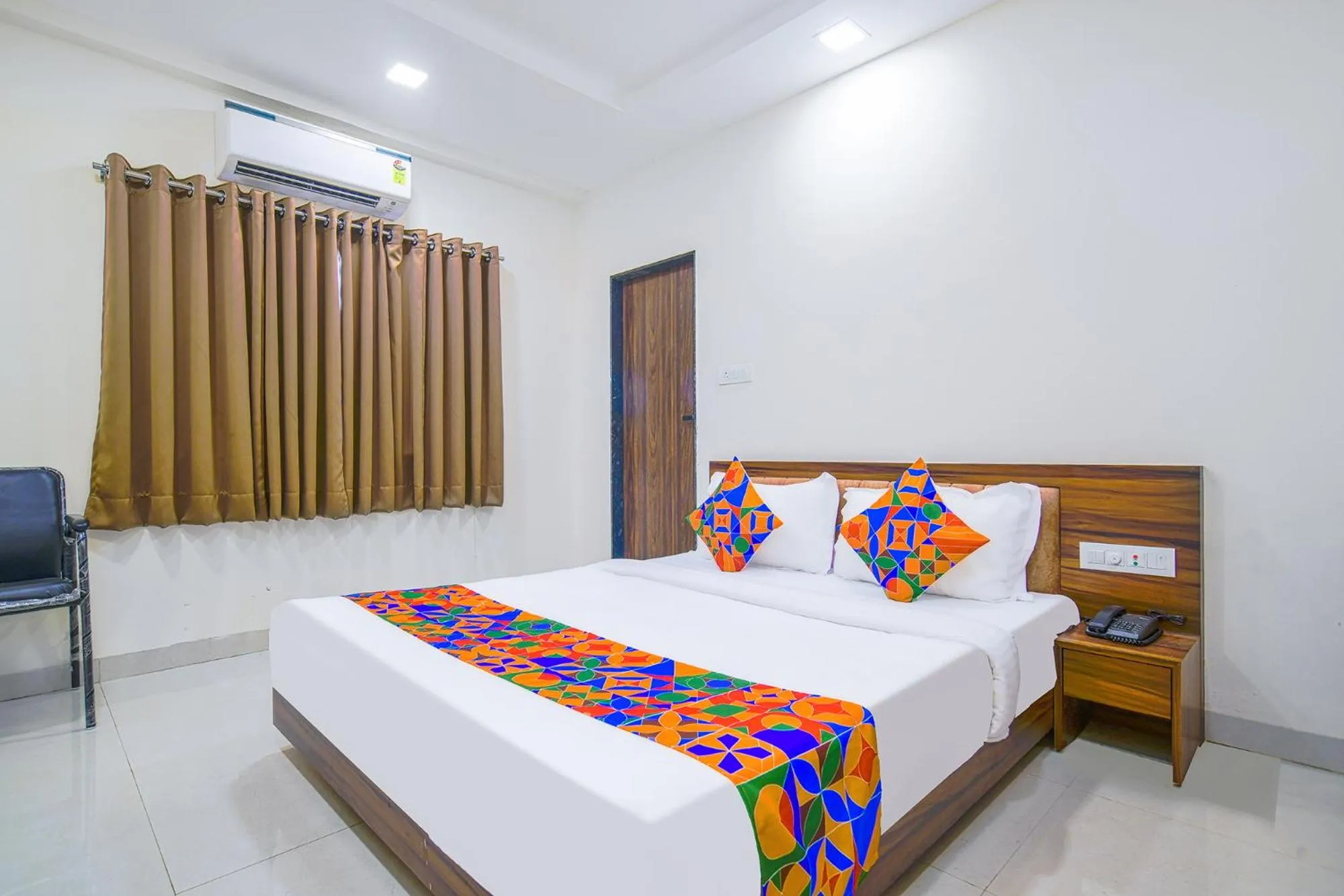 Bed in FabHotel J Palace