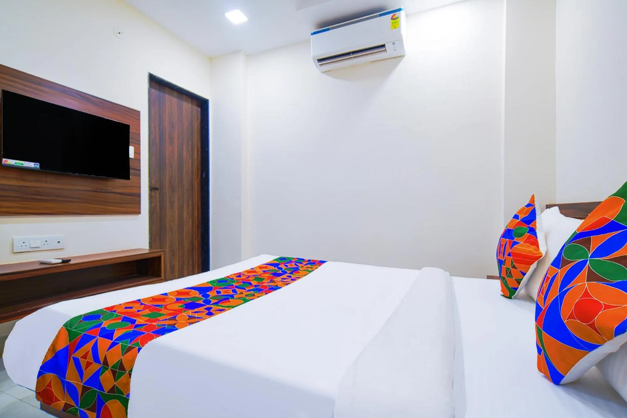 Bed in FabHotel J Palace