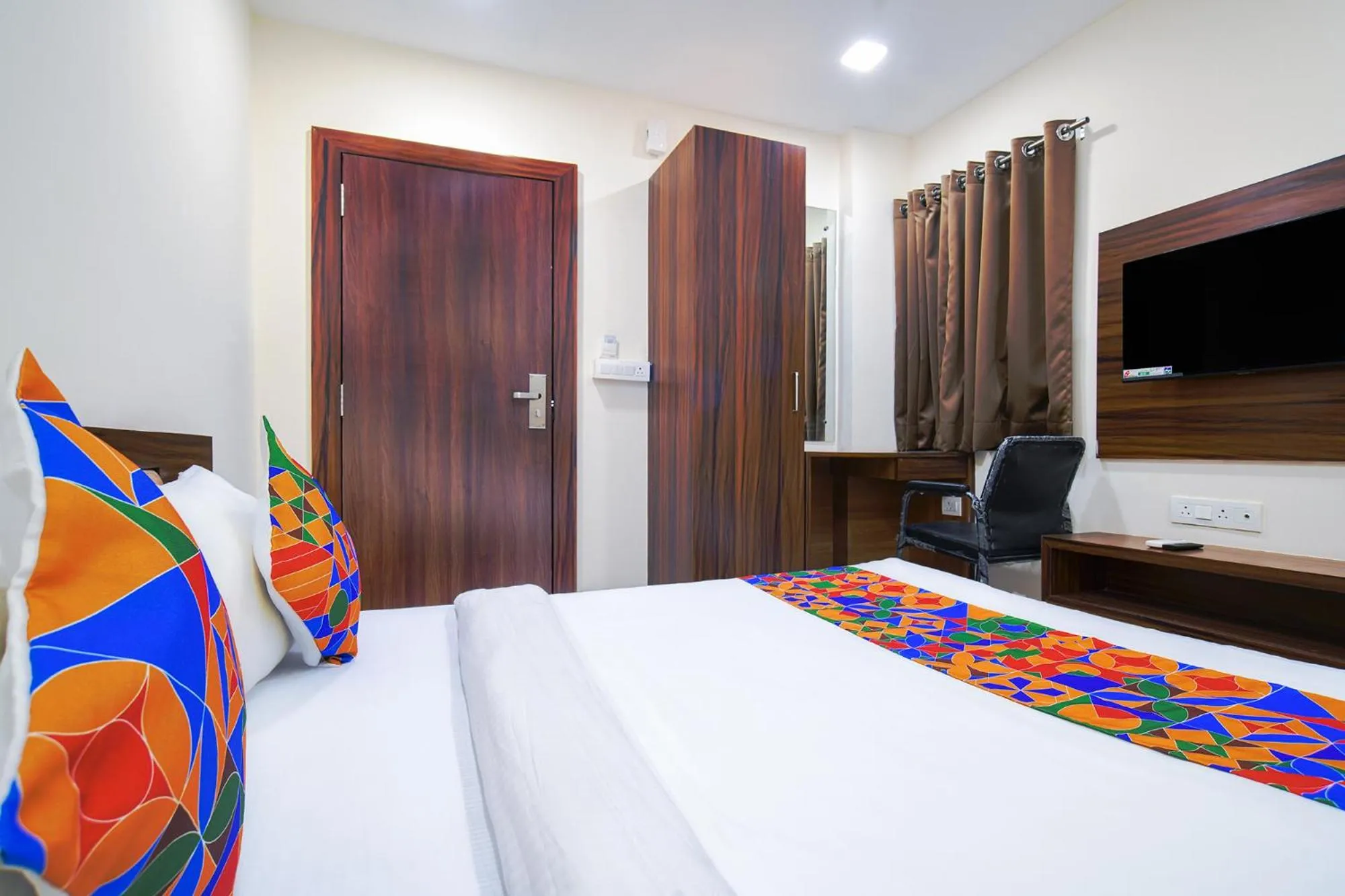 Bed in FabHotel J Palace