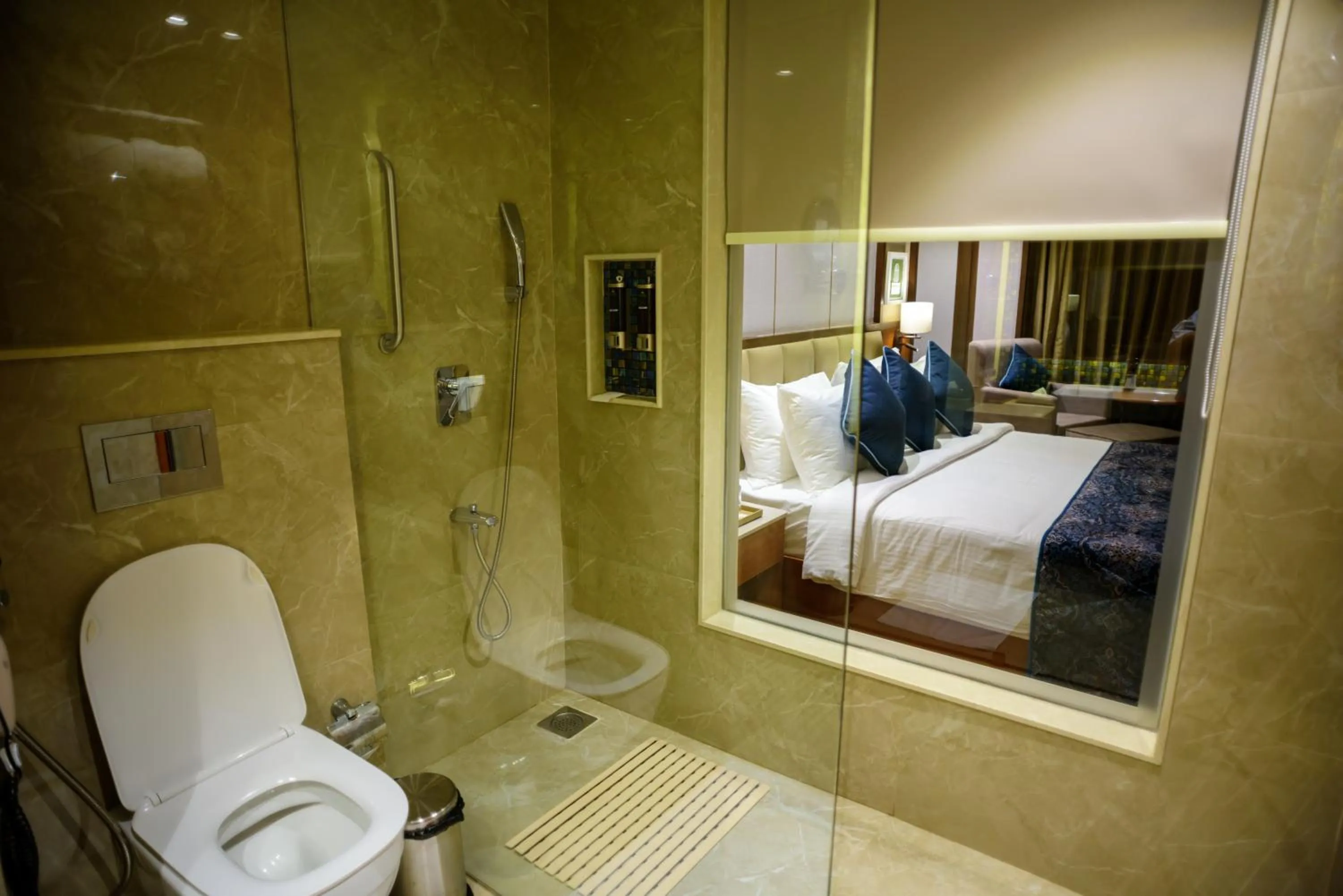 Toilet, Bed in Fortune Select Candolim, Goa - Member ITC Hotels' Group