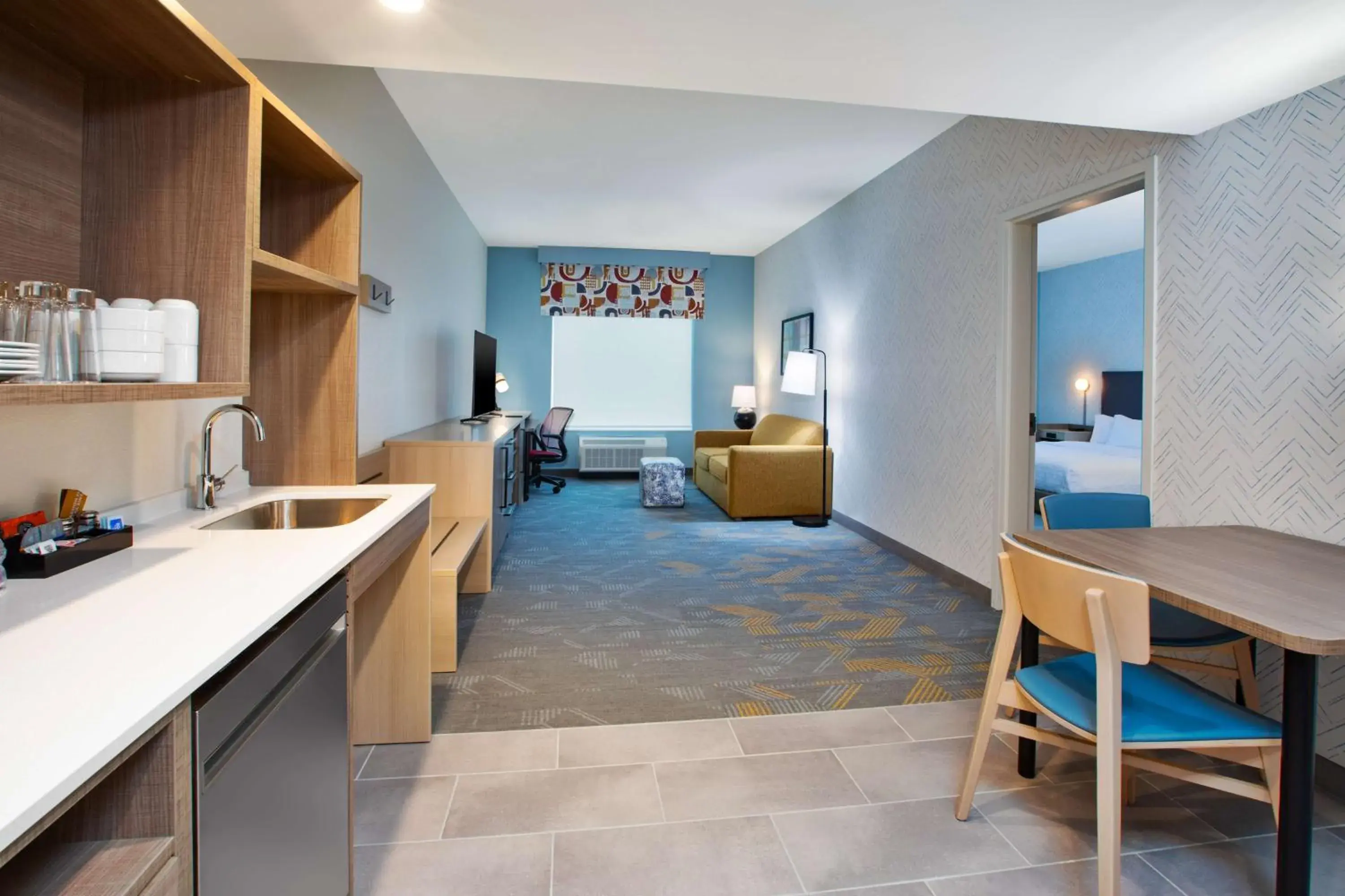 Living room in Home2 Suites By Hilton Grand Rapids Northeast Living room in Home2 Suites By Hilton Grand Rapids Northeast