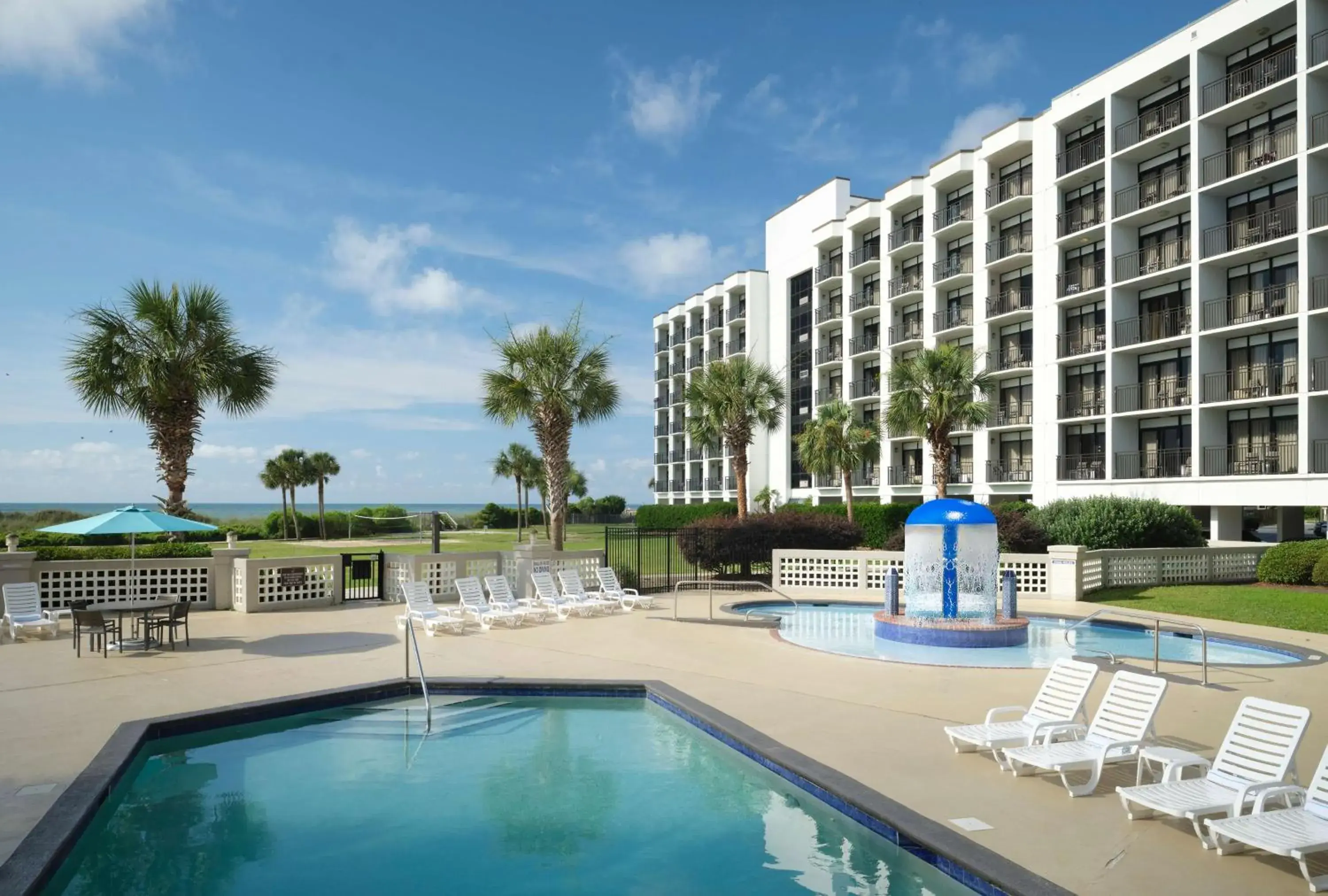Pool view in The Ellie Beach Resort Myrtle Beach, Tapestry By Hilton Pool view in The Ellie Beach Resort Myrtle Beach, Tapestry By Hilton