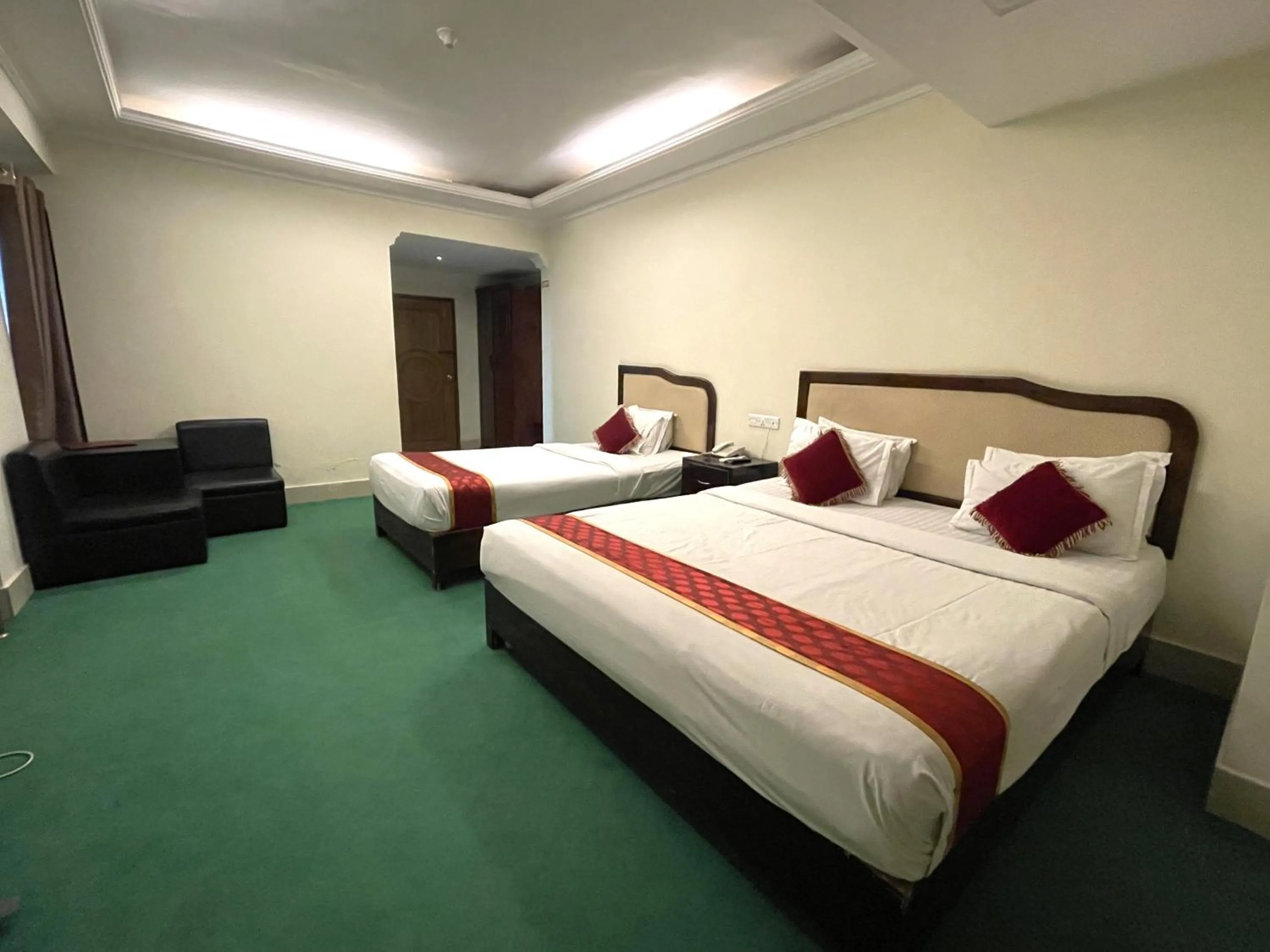 Bed in Panshi Inn Sylhet