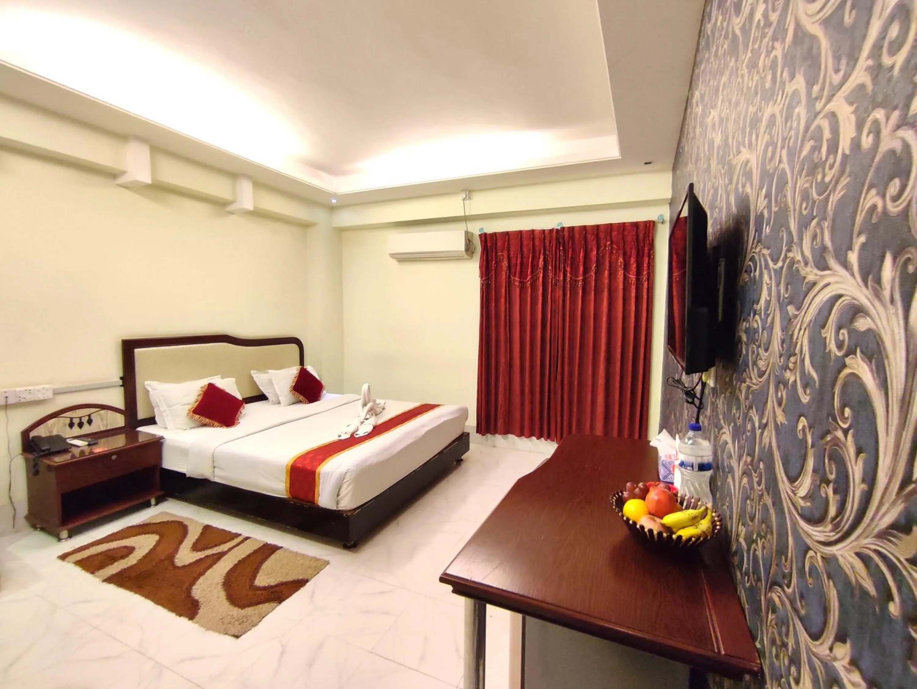 Bed in Panshi Inn Sylhet