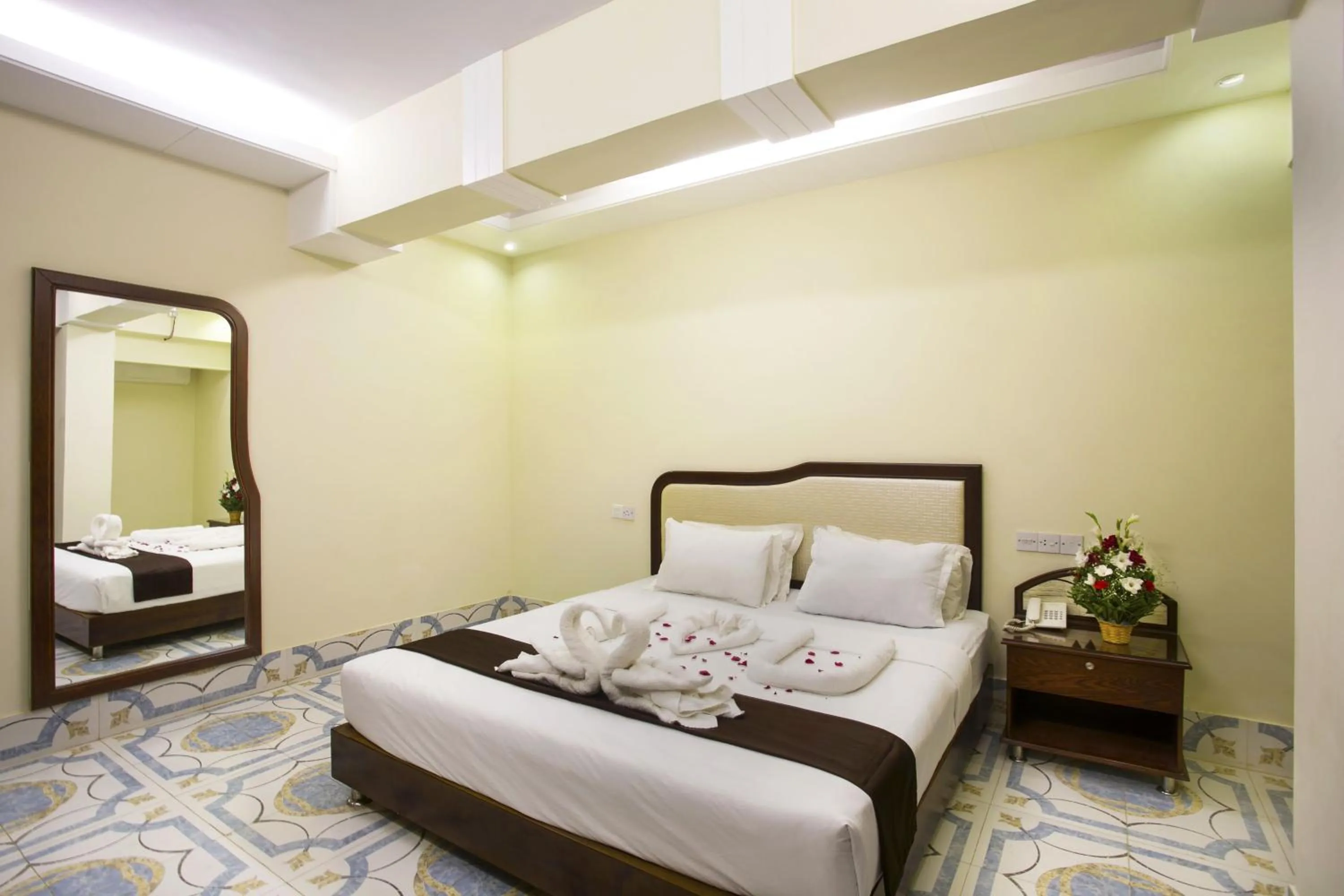 Bed in Panshi Inn Sylhet
