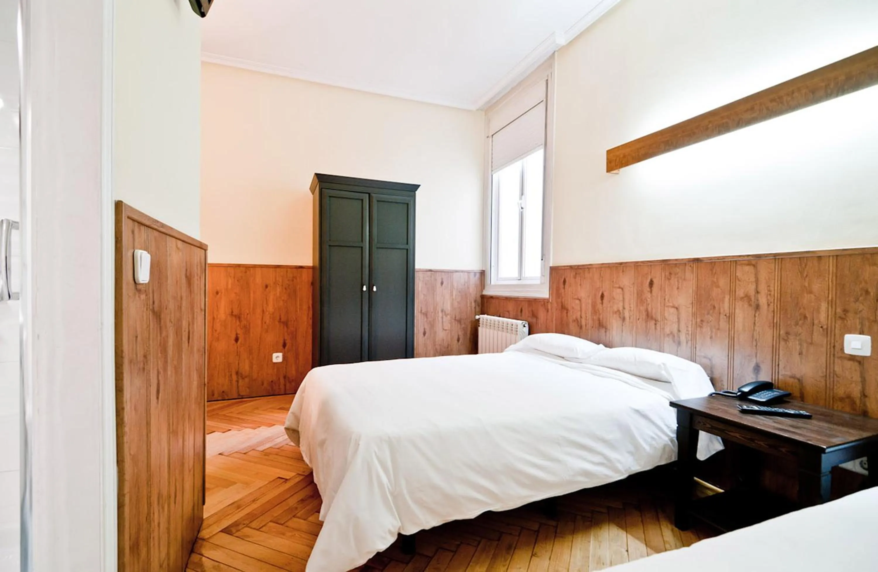 Photo of the whole room, Bed in Hostal Asunción