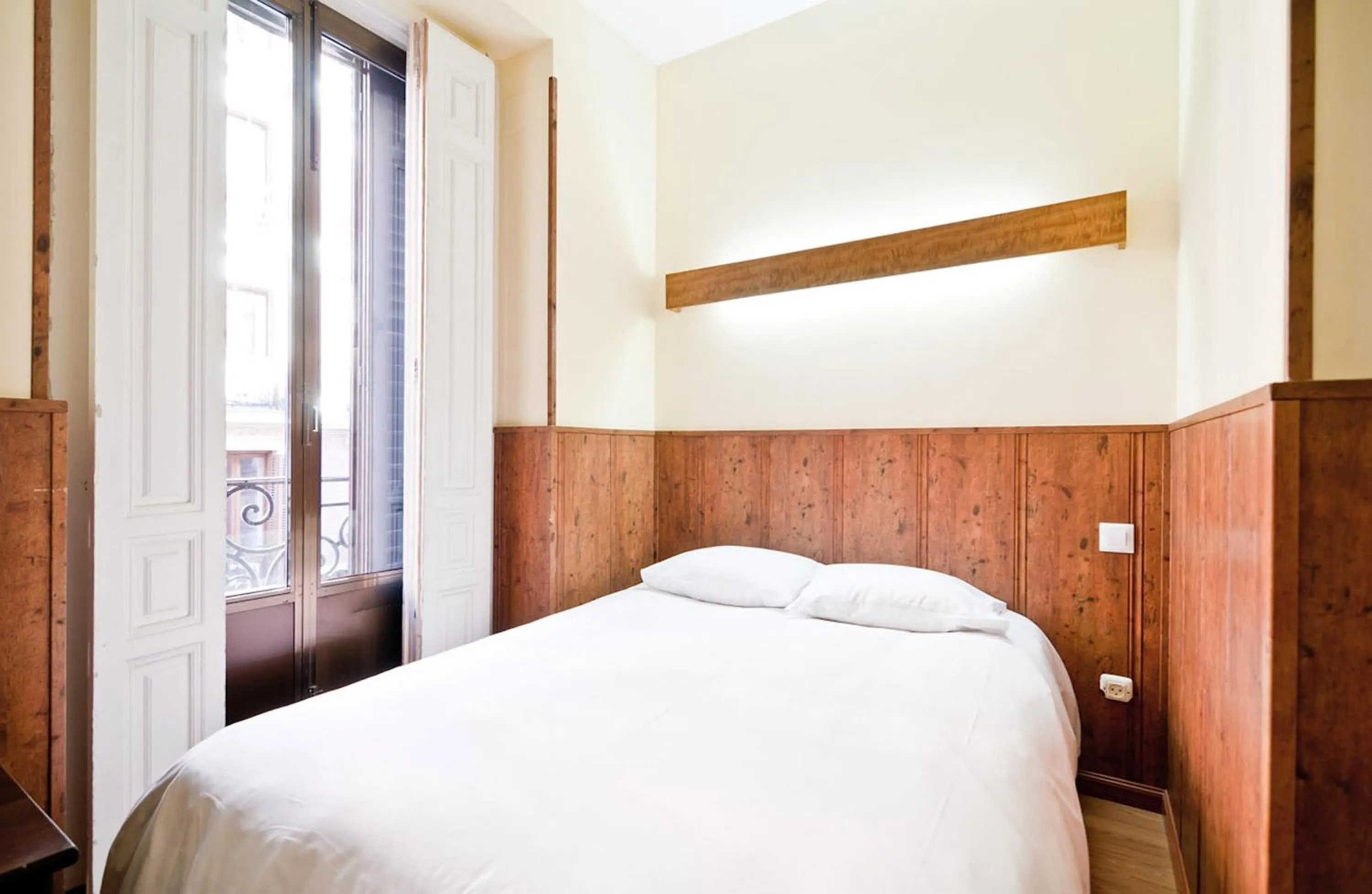 Bed in Hostal Asunción