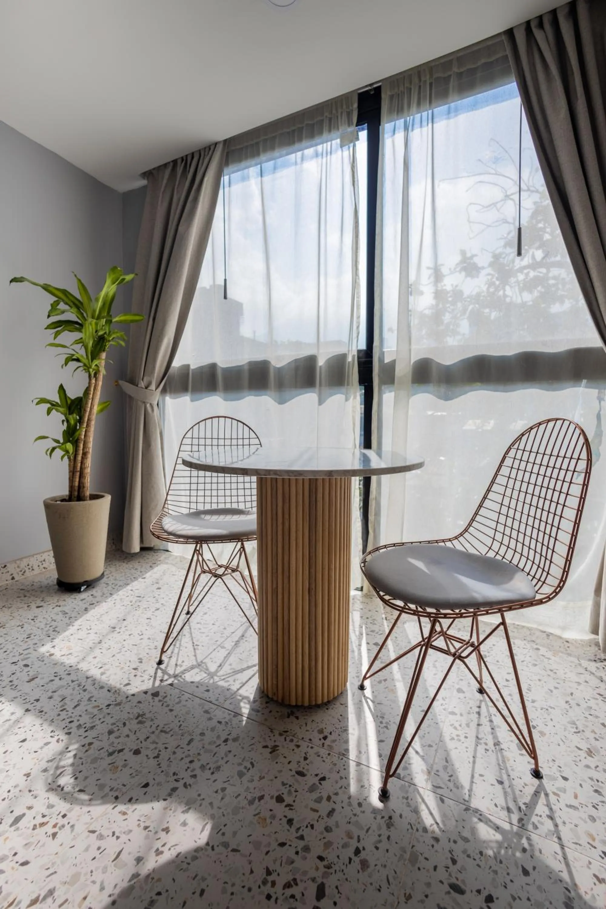 Seating area in The O by Seekers Medellín