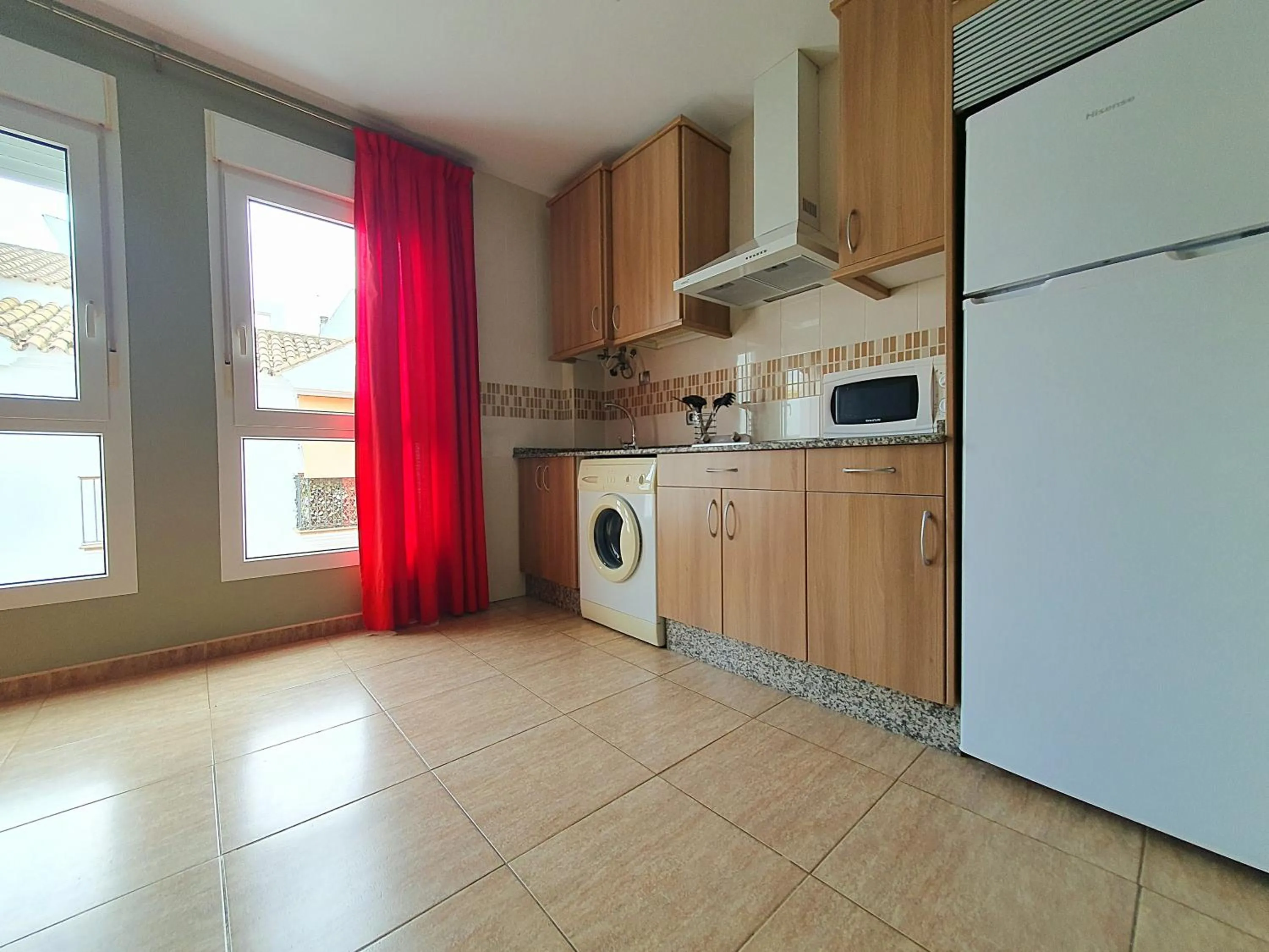 Kitchen or kitchenette in Hotel y Apartamentos Conilsol