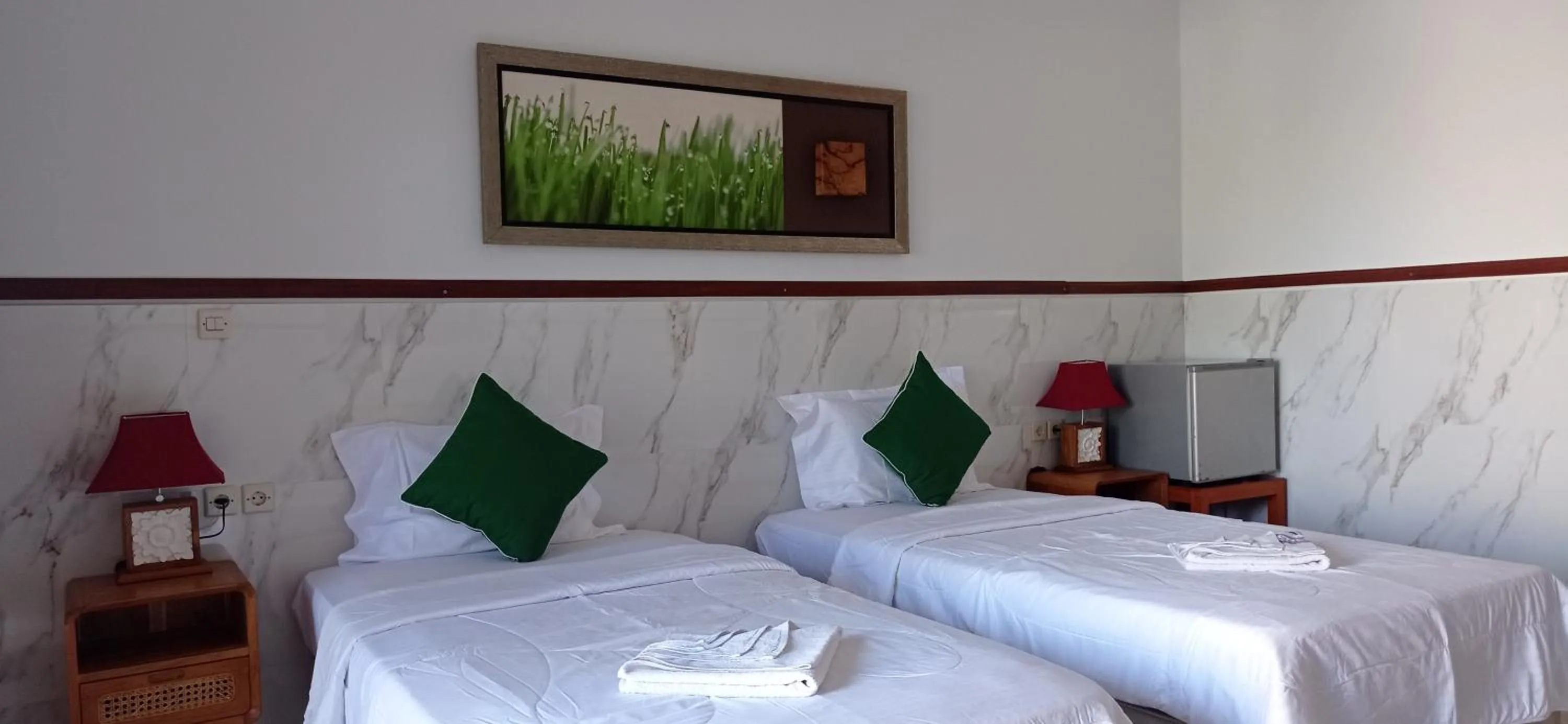 Bed in khrisna Bungalow Tulamben