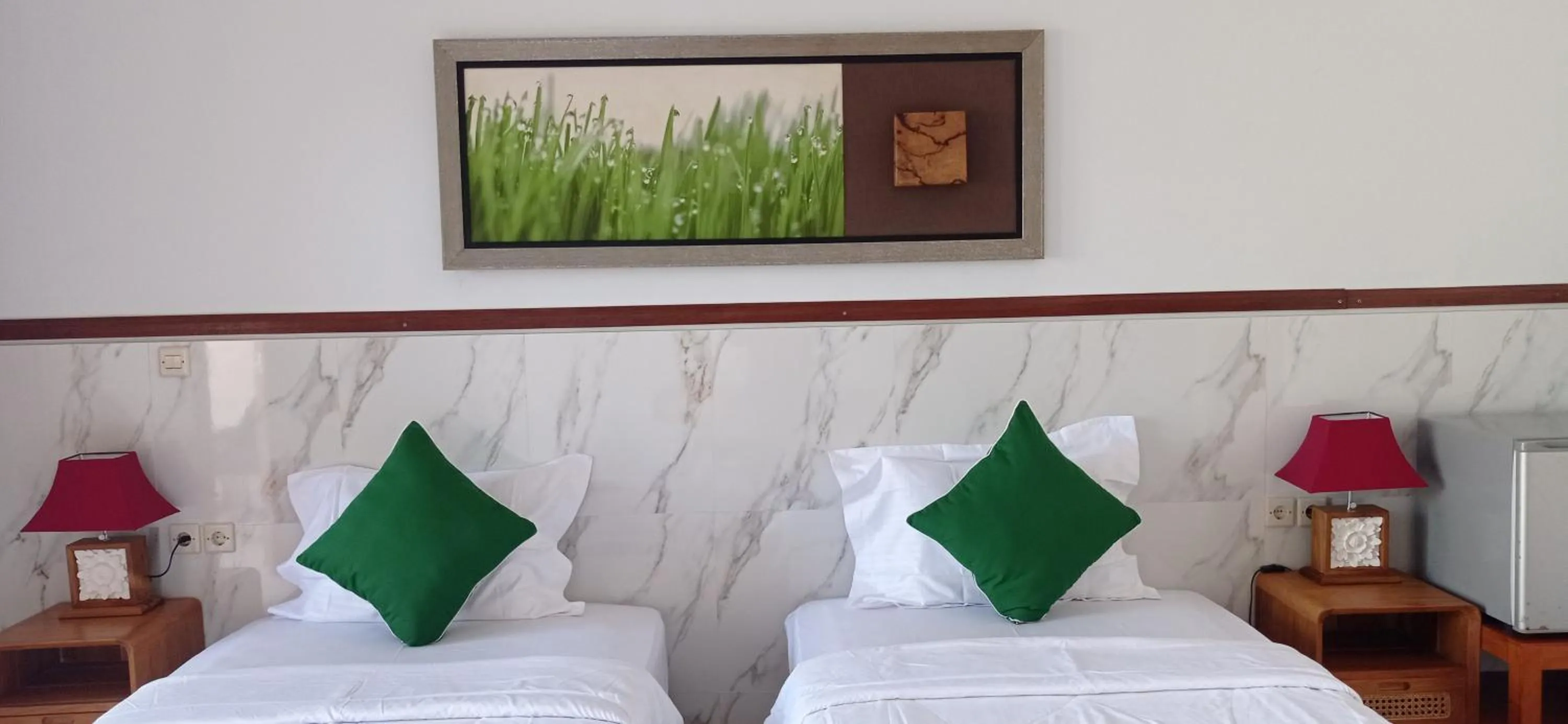 Bed in khrisna Bungalow Tulamben
