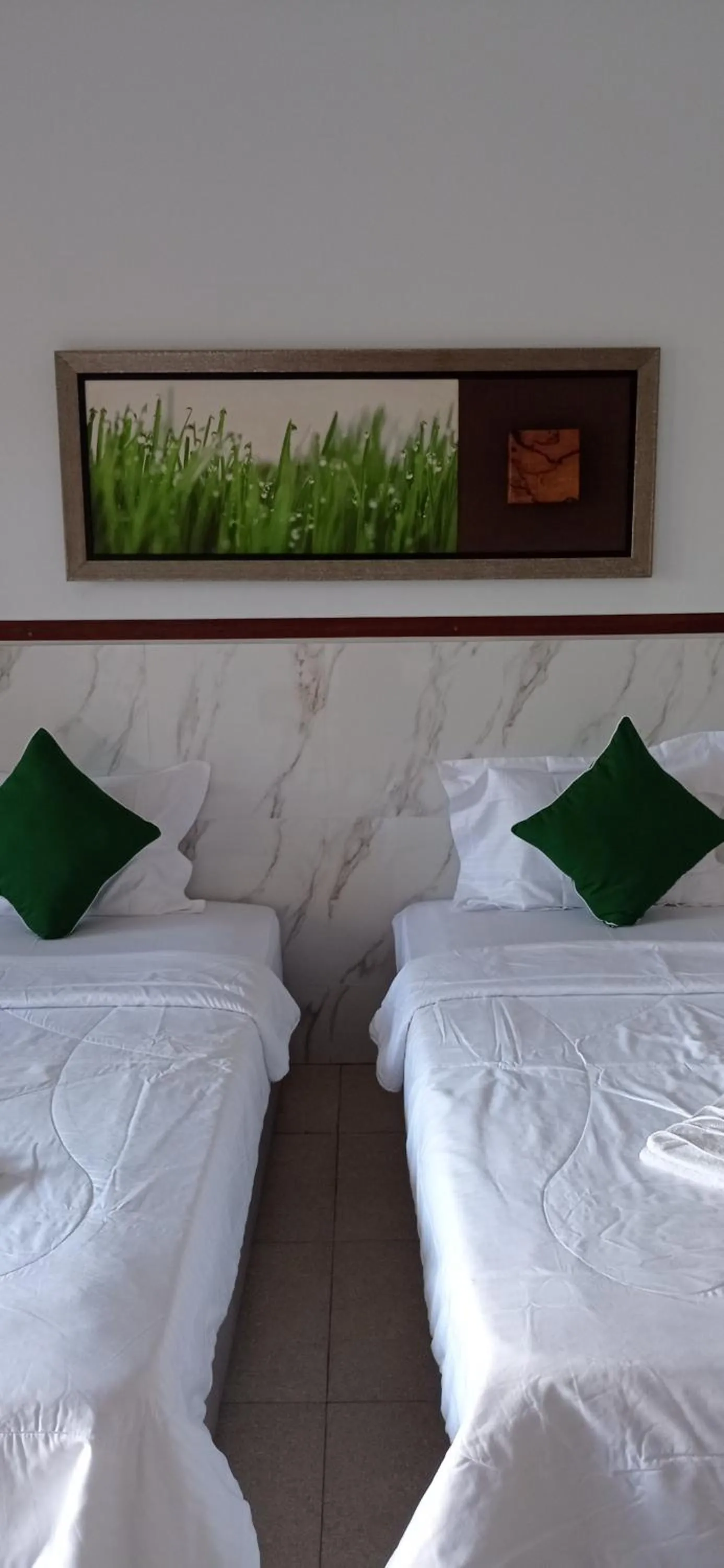 Bed in khrisna Bungalow Tulamben
