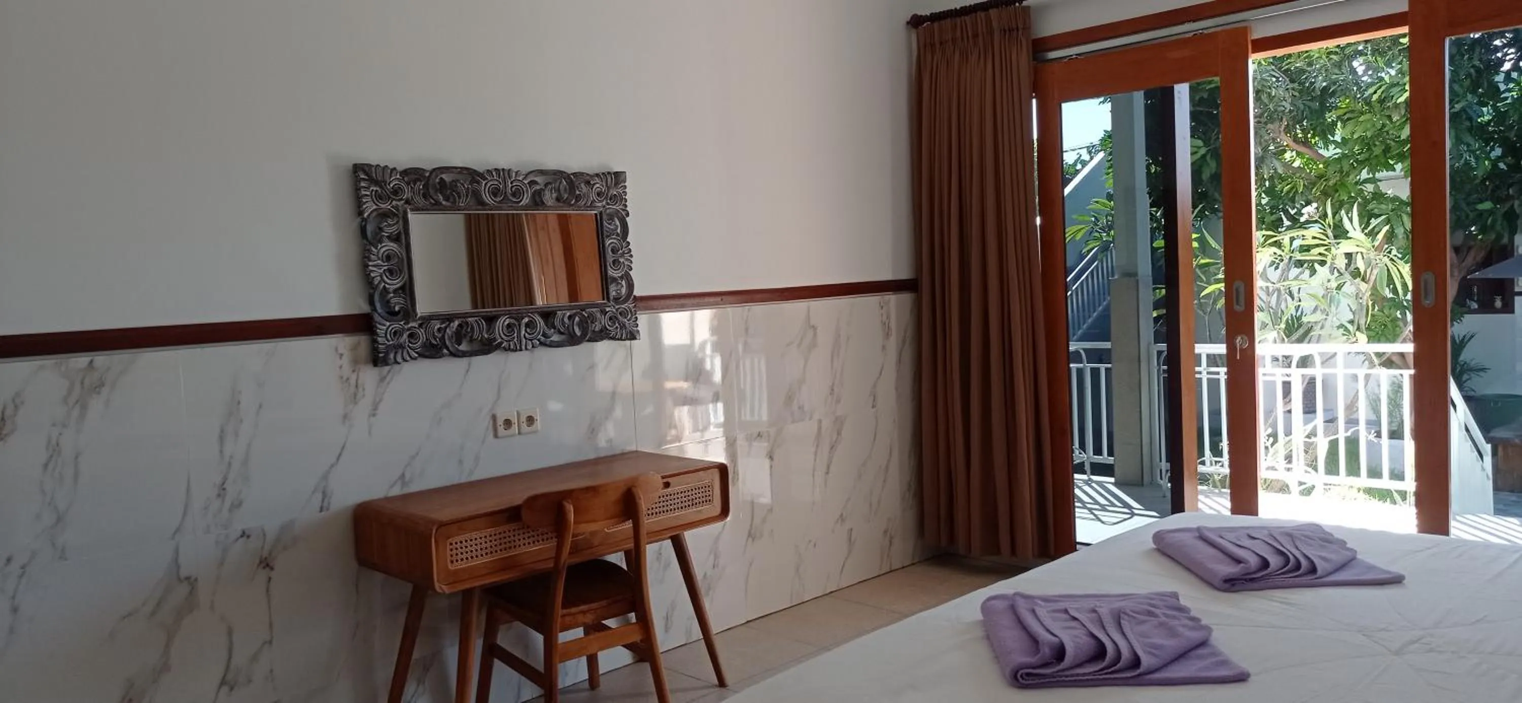 Bed in khrisna Bungalow Tulamben