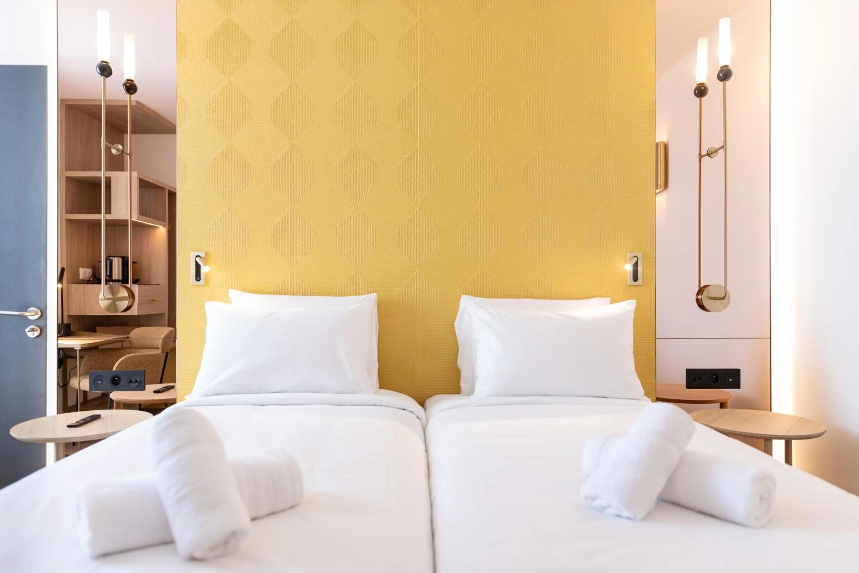 Bed in Hôtel Kyriad Prestige Paris Asnieres