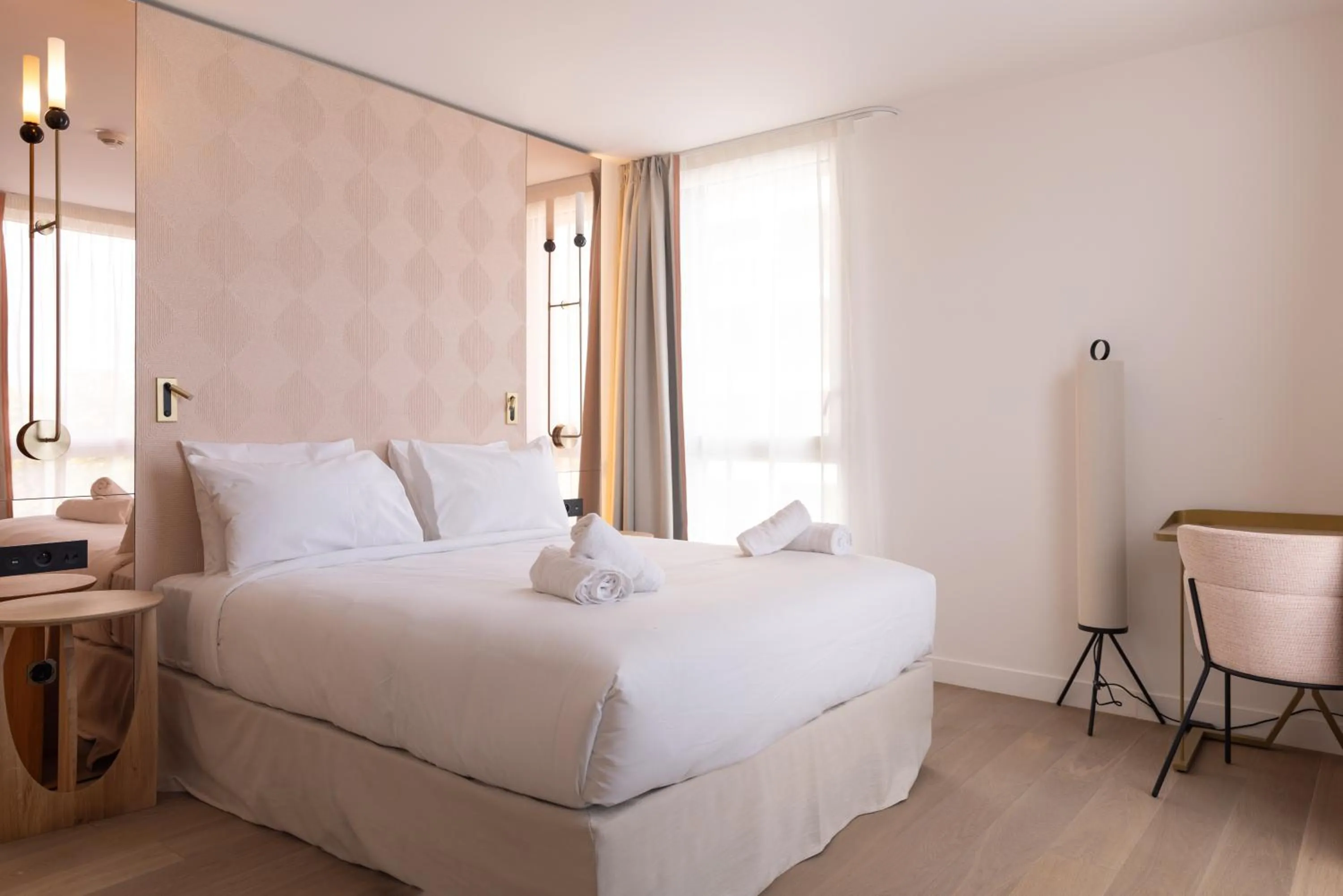 Bed in Hôtel Kyriad Prestige Paris Asnieres