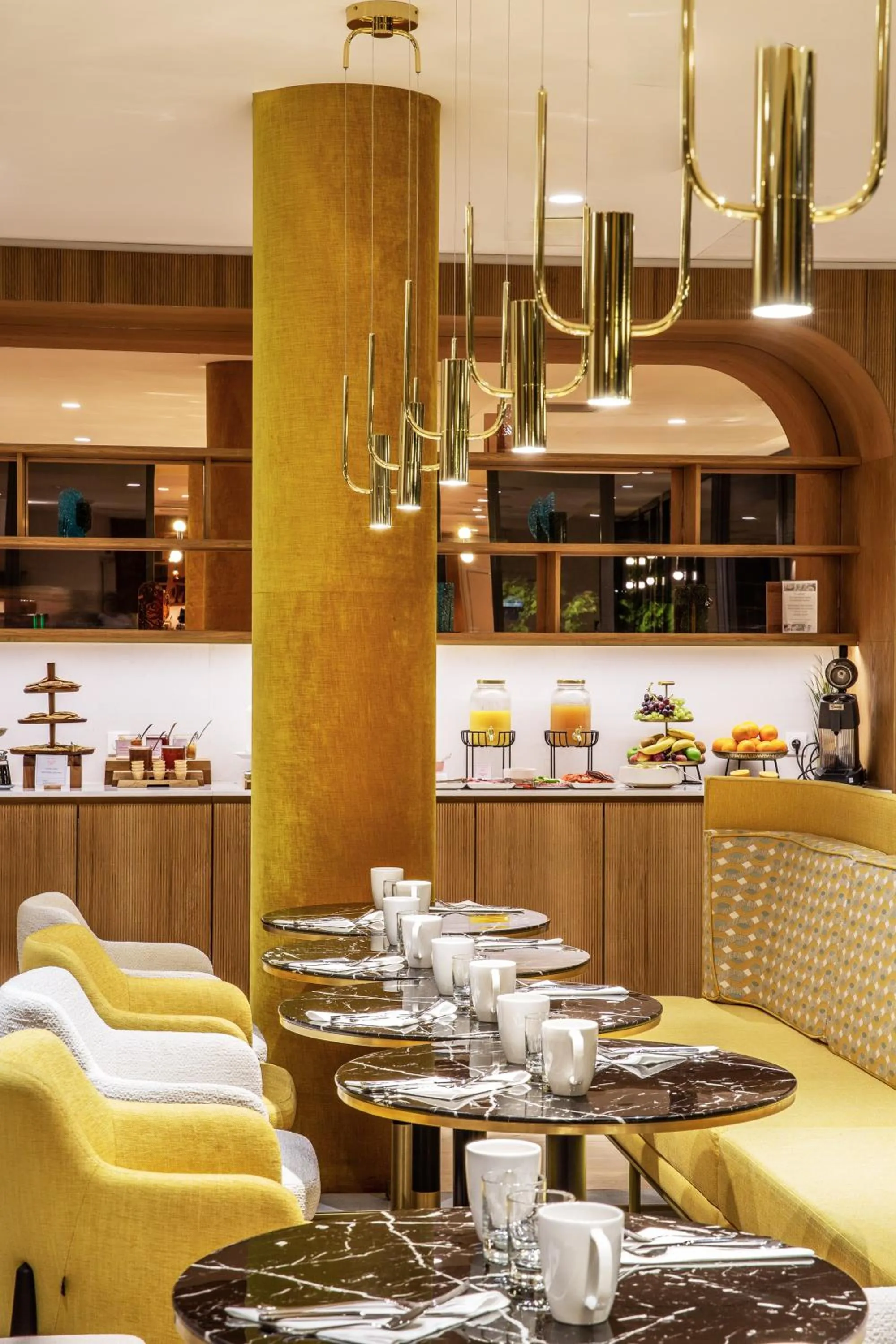 Living room in Hôtel Kyriad Prestige Paris Asnieres