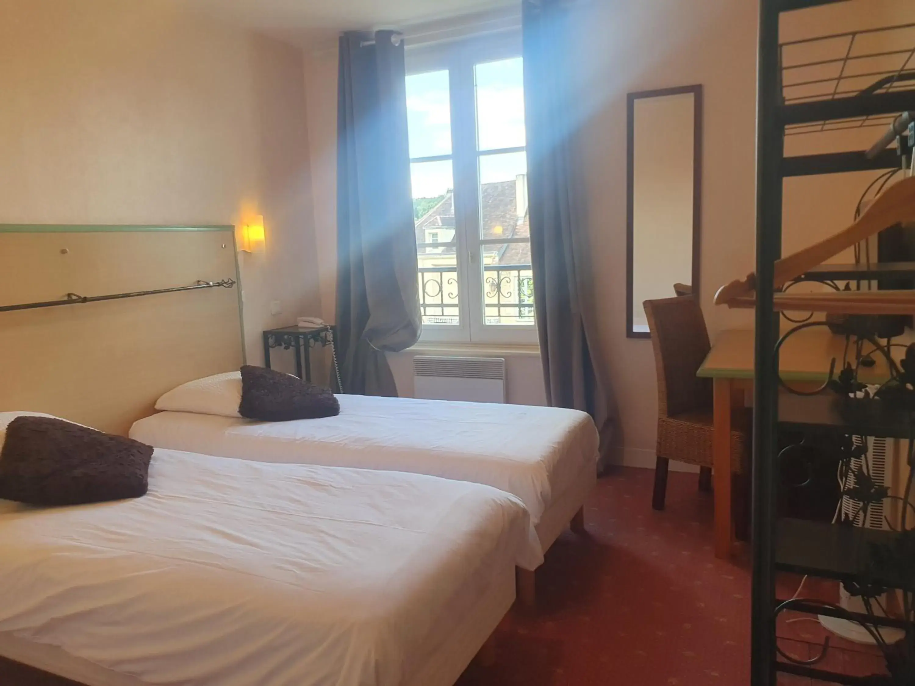 Bed in Hotel Auberge du Fin Chapon Bed in Hotel Auberge du Fin Chapon