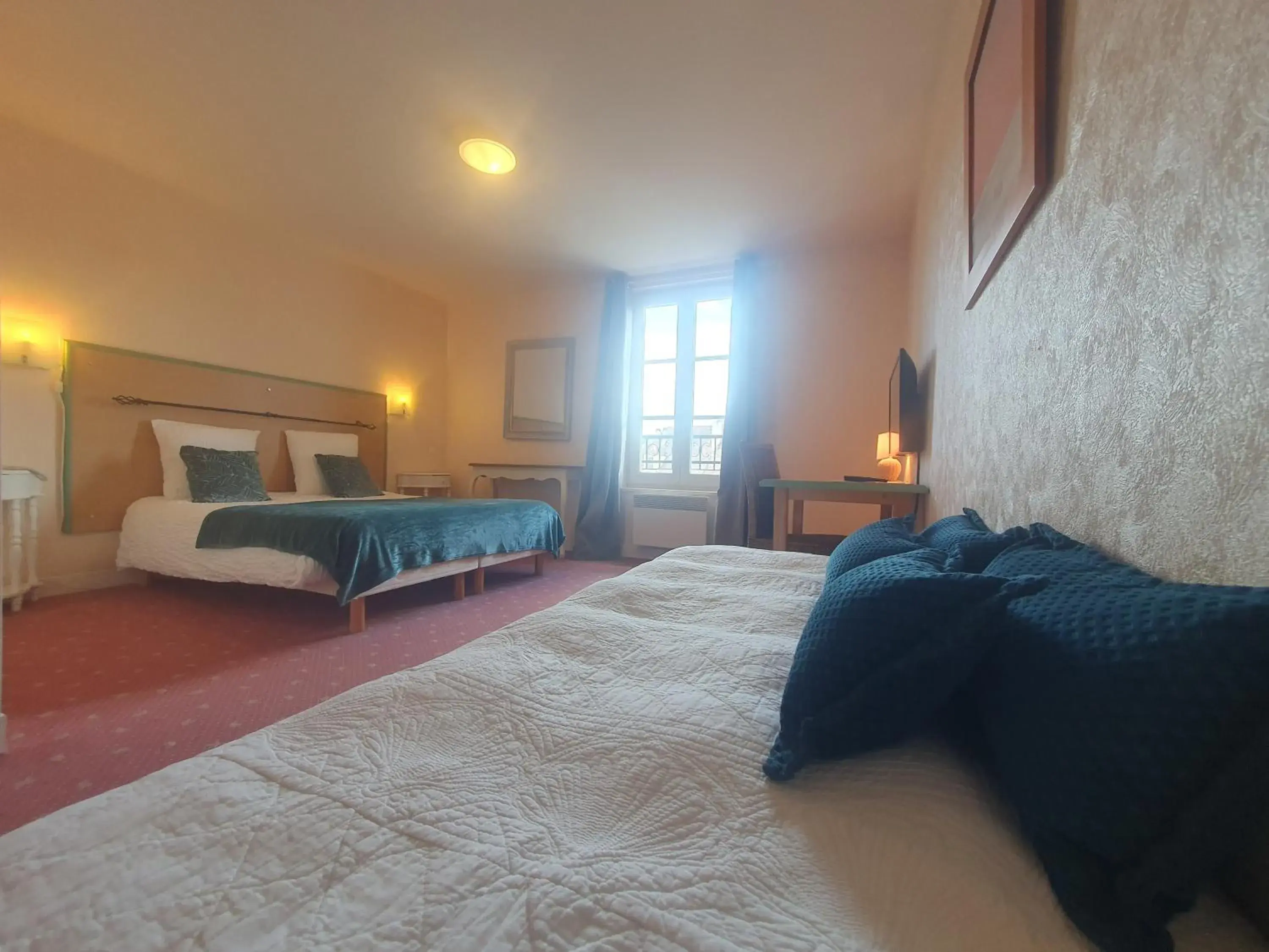 Bed in Hotel Auberge du Fin Chapon Bed in Hotel Auberge du Fin Chapon