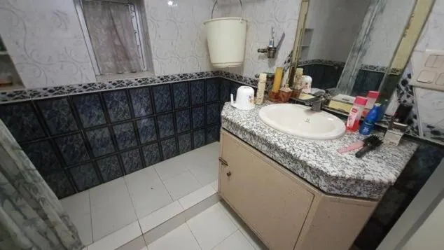 Shower in PRITHVI FARM COTTAGE AND VILLA