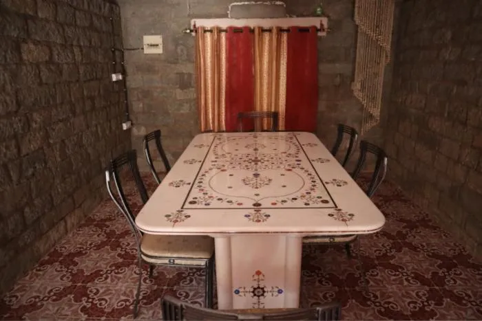 Dining area in PRITHVI FARM COTTAGE AND VILLA