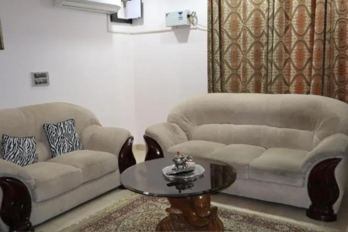 Living room in PRITHVI FARM COTTAGE AND VILLA